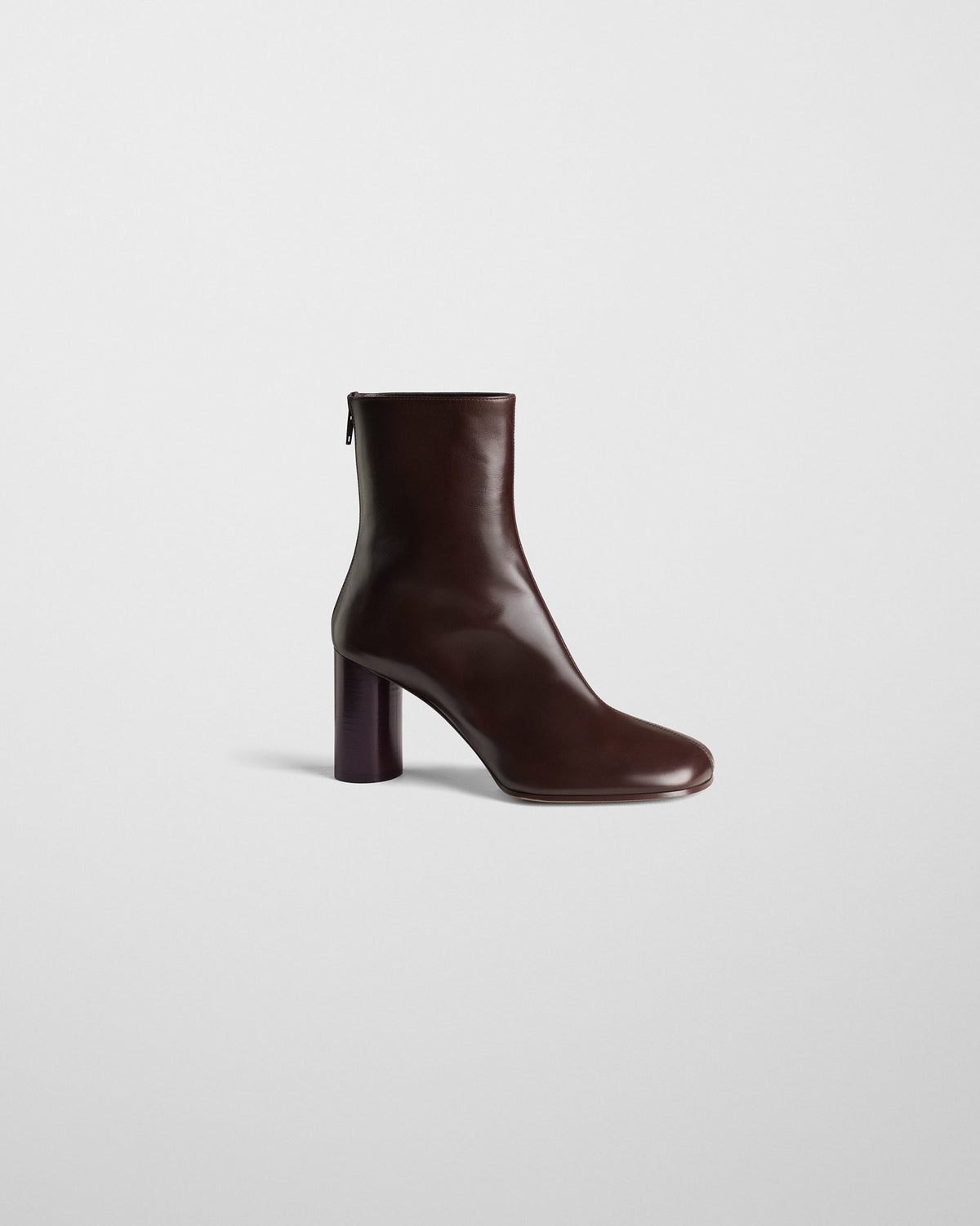 Side view of TUG ANKLE BOOT in plum brown leather