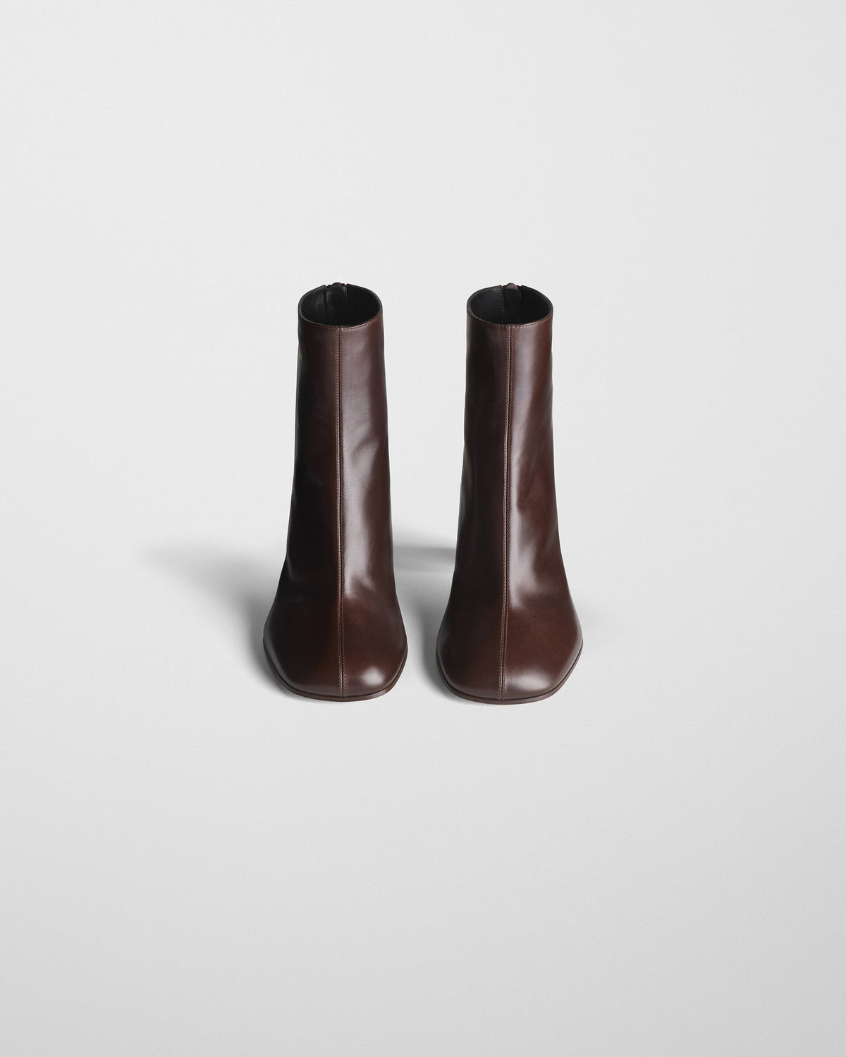 Front view of TUG ANKLE BOOT in plum brown leather