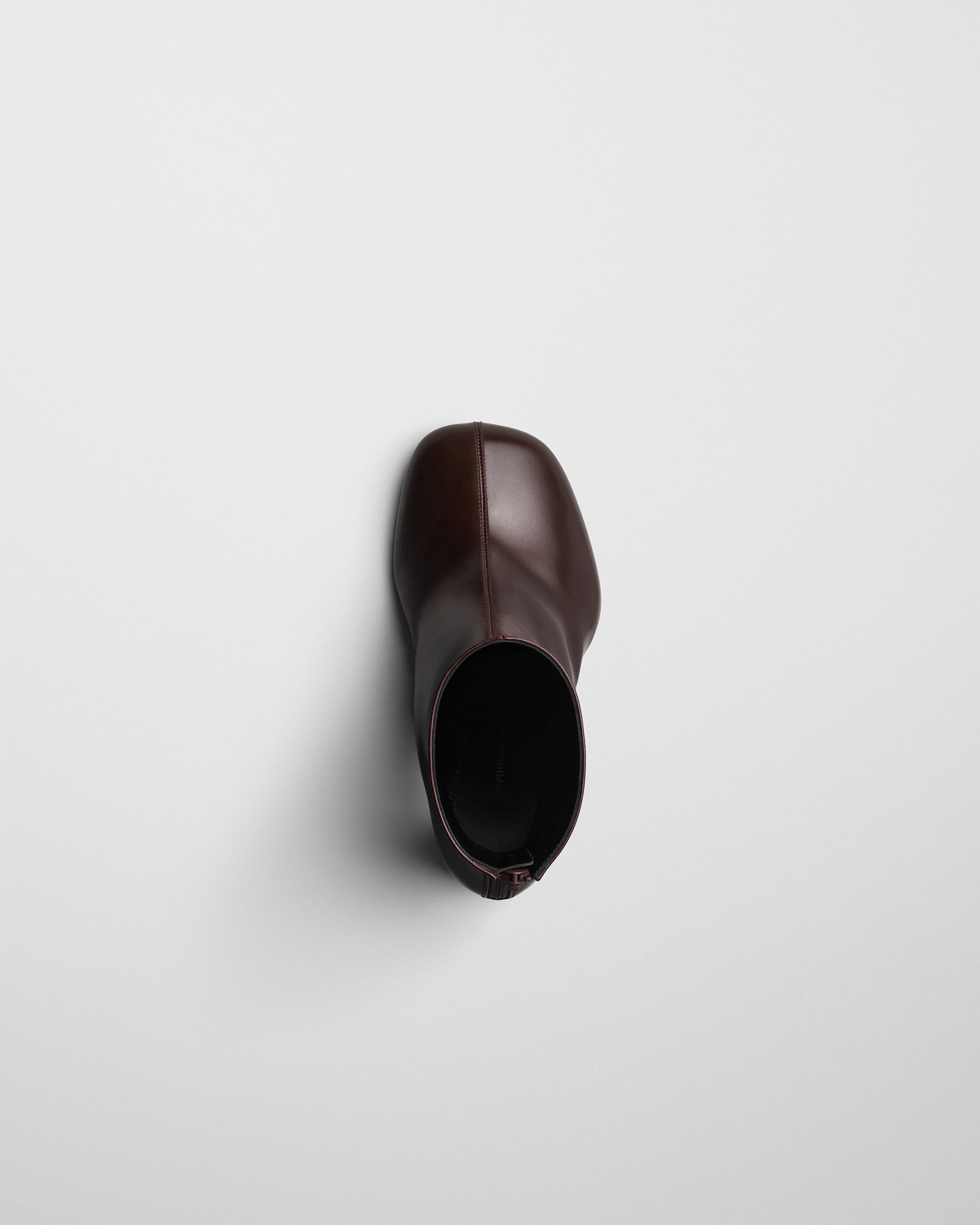 View of TUG ANKLE BOOT in plum brown leather