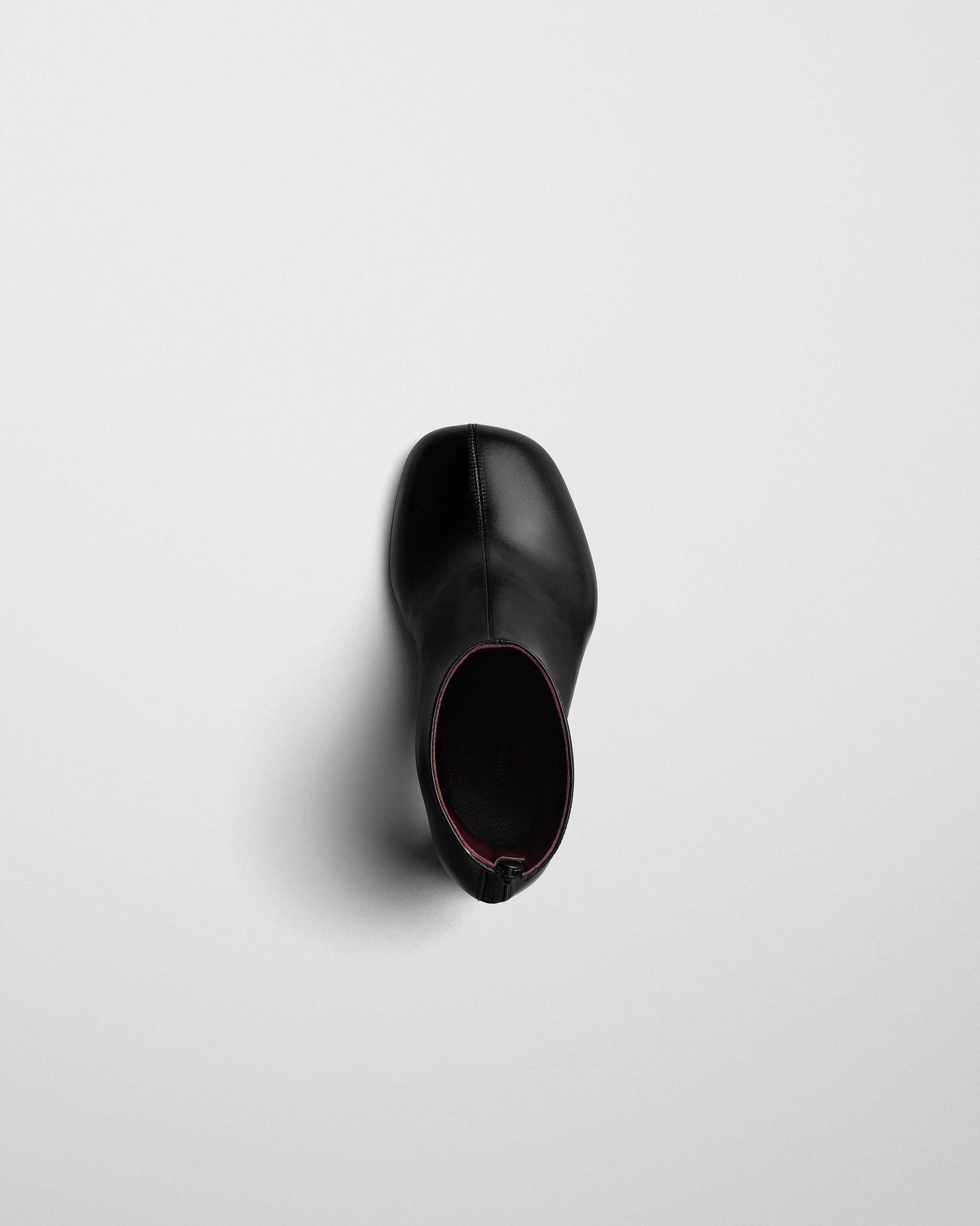 View of TUG ANKLE BOOT in black leather