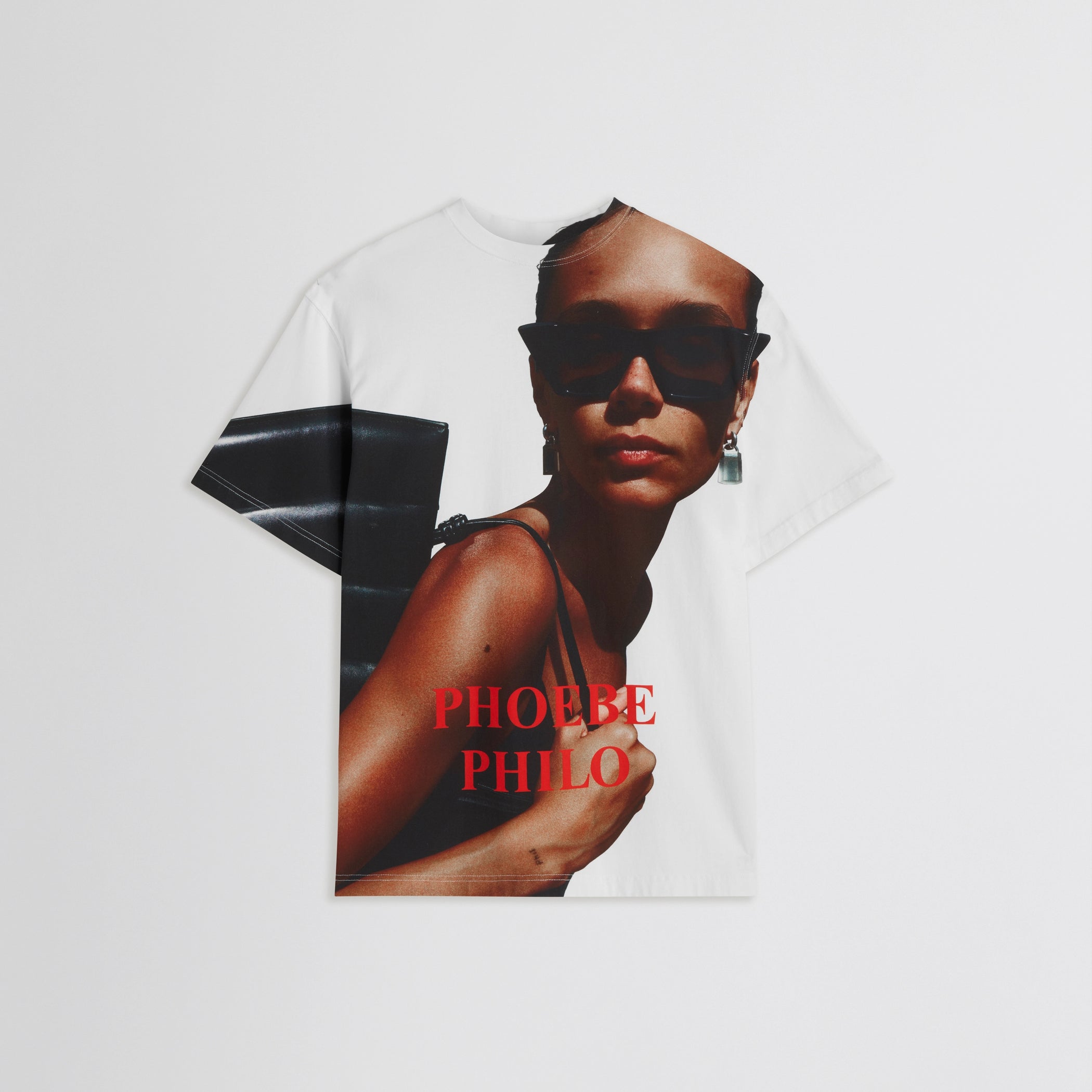 Flat front view of zine t-shirt in face print cotton 