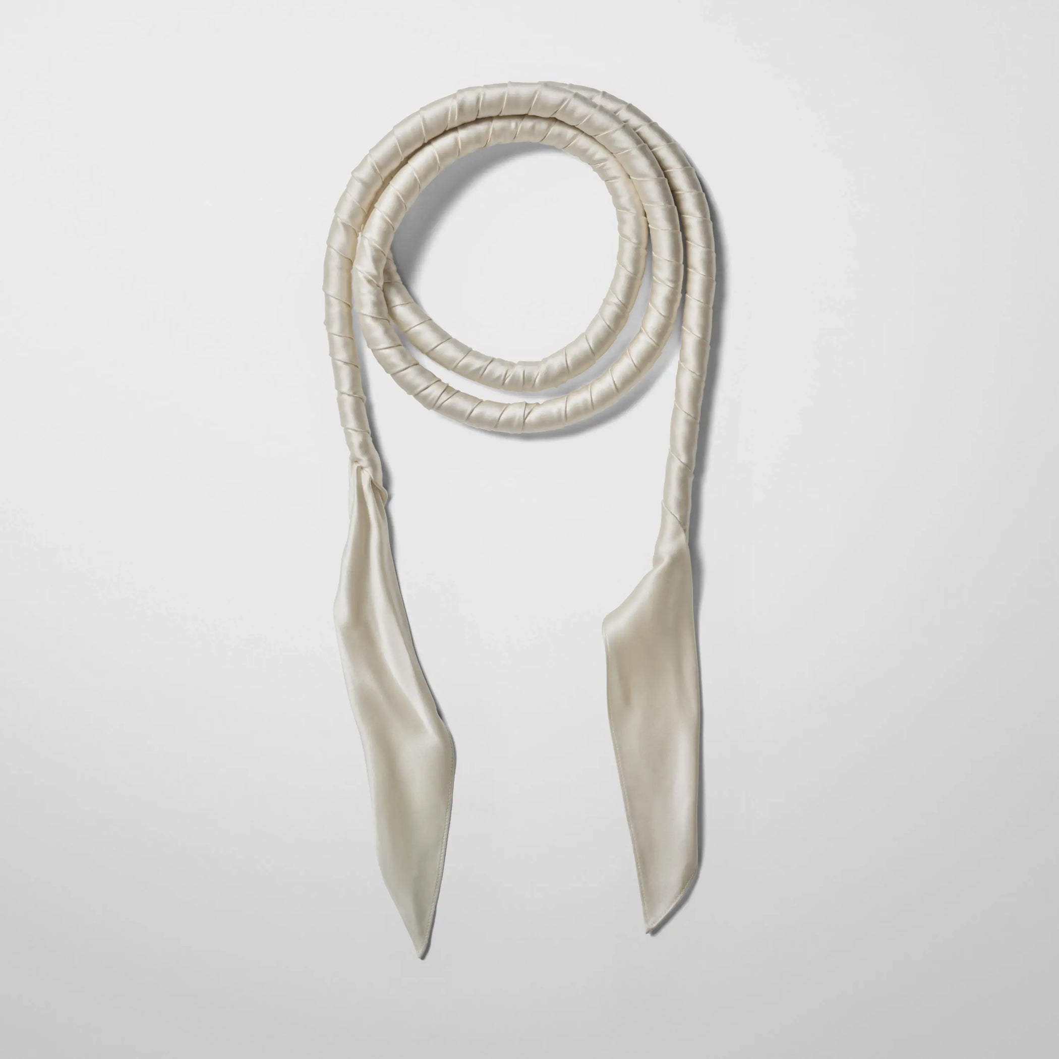 Front view of twisted scarf in cream satin