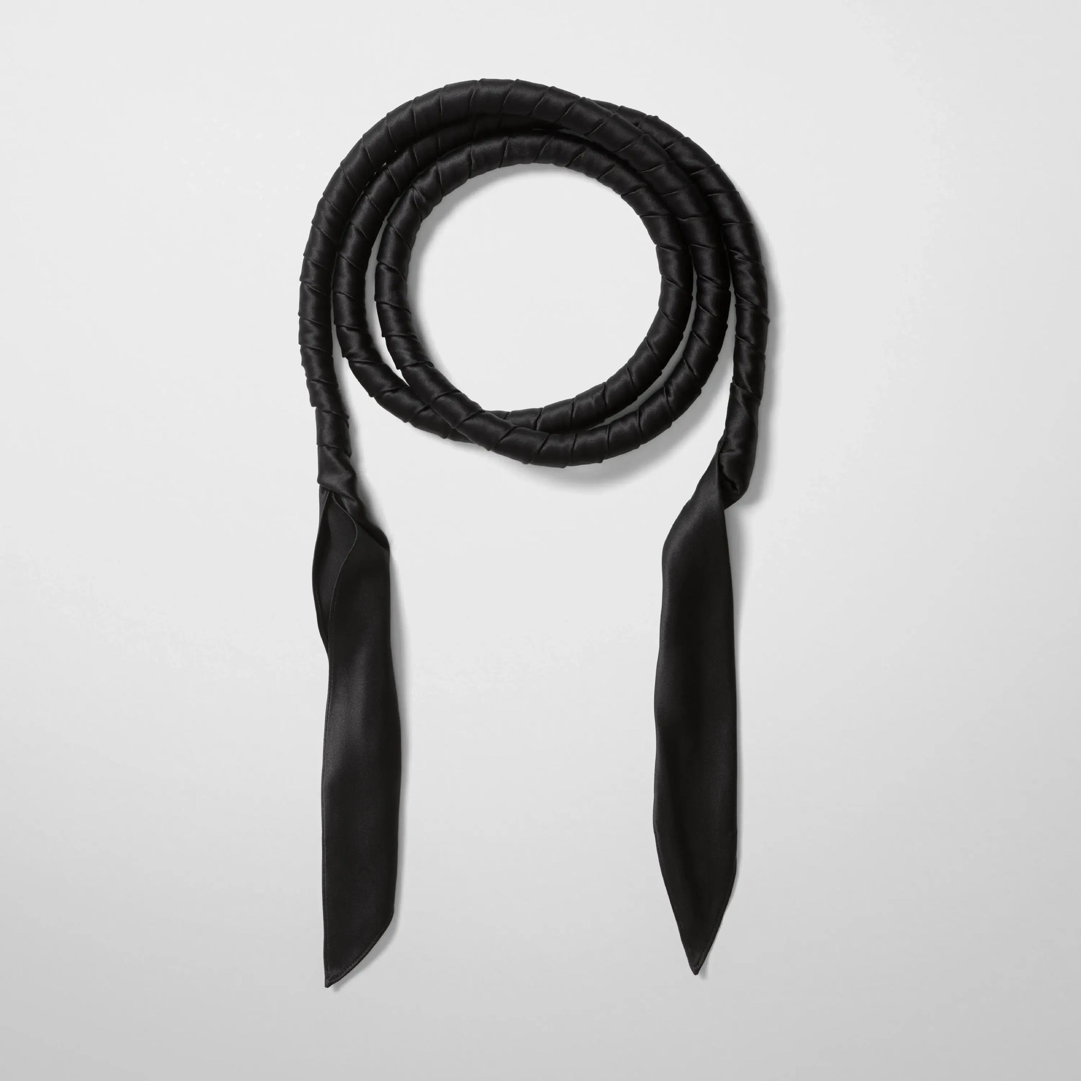 Front view of twisted scarf in black satin 