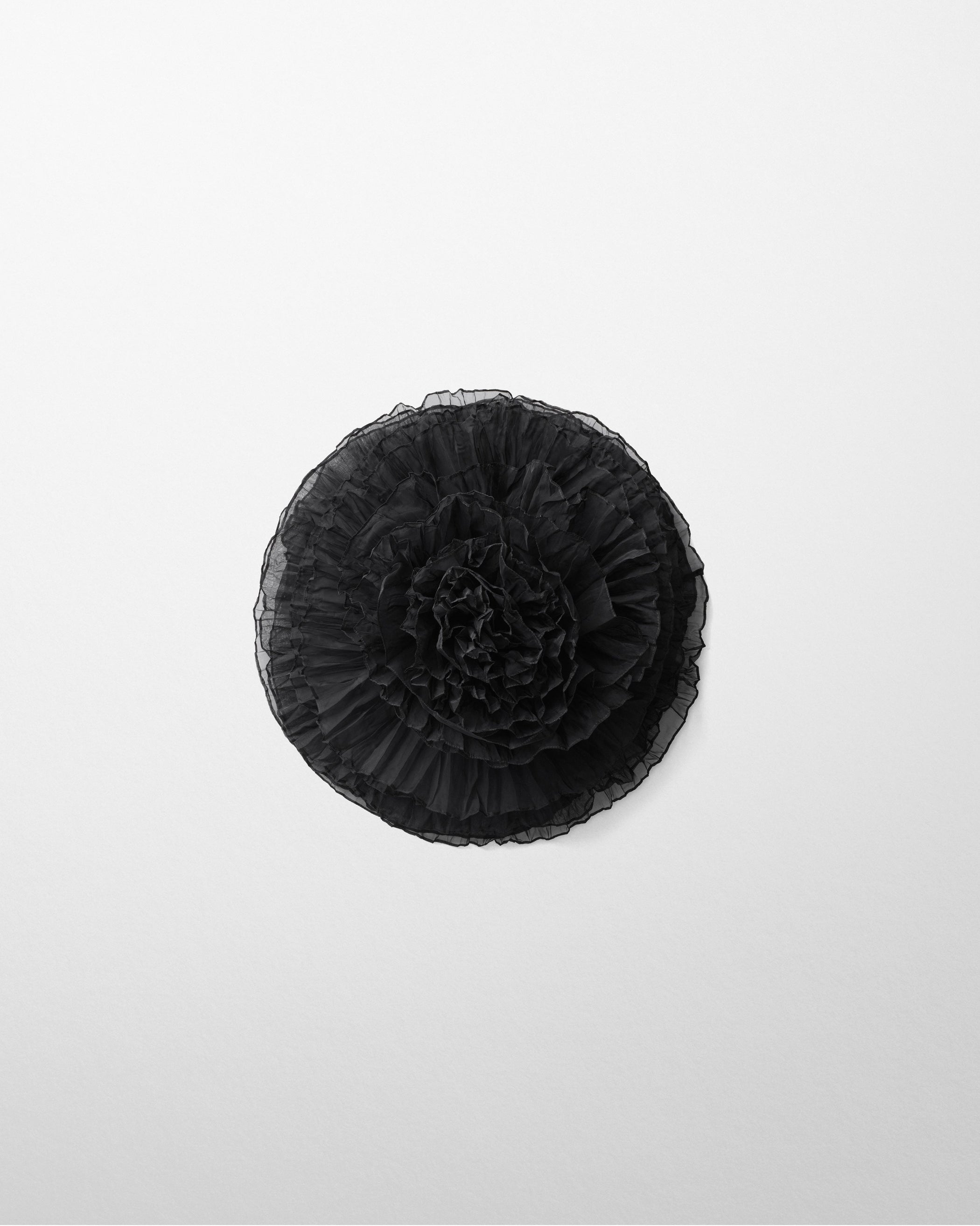 Flat front view of FULL BLOOM BROOCH in black silk