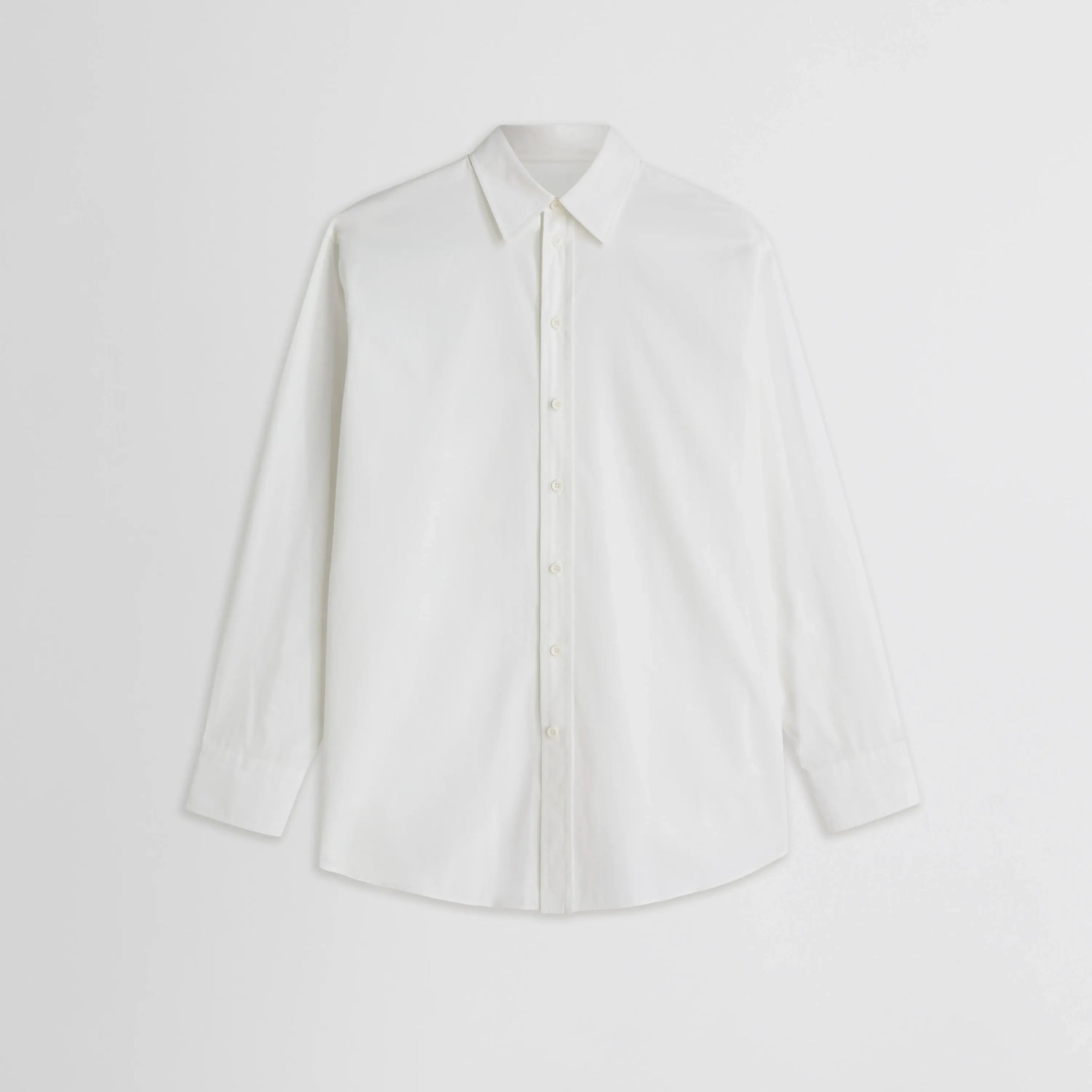 Front flat lay view of Sharp Collar Shirt in white. 