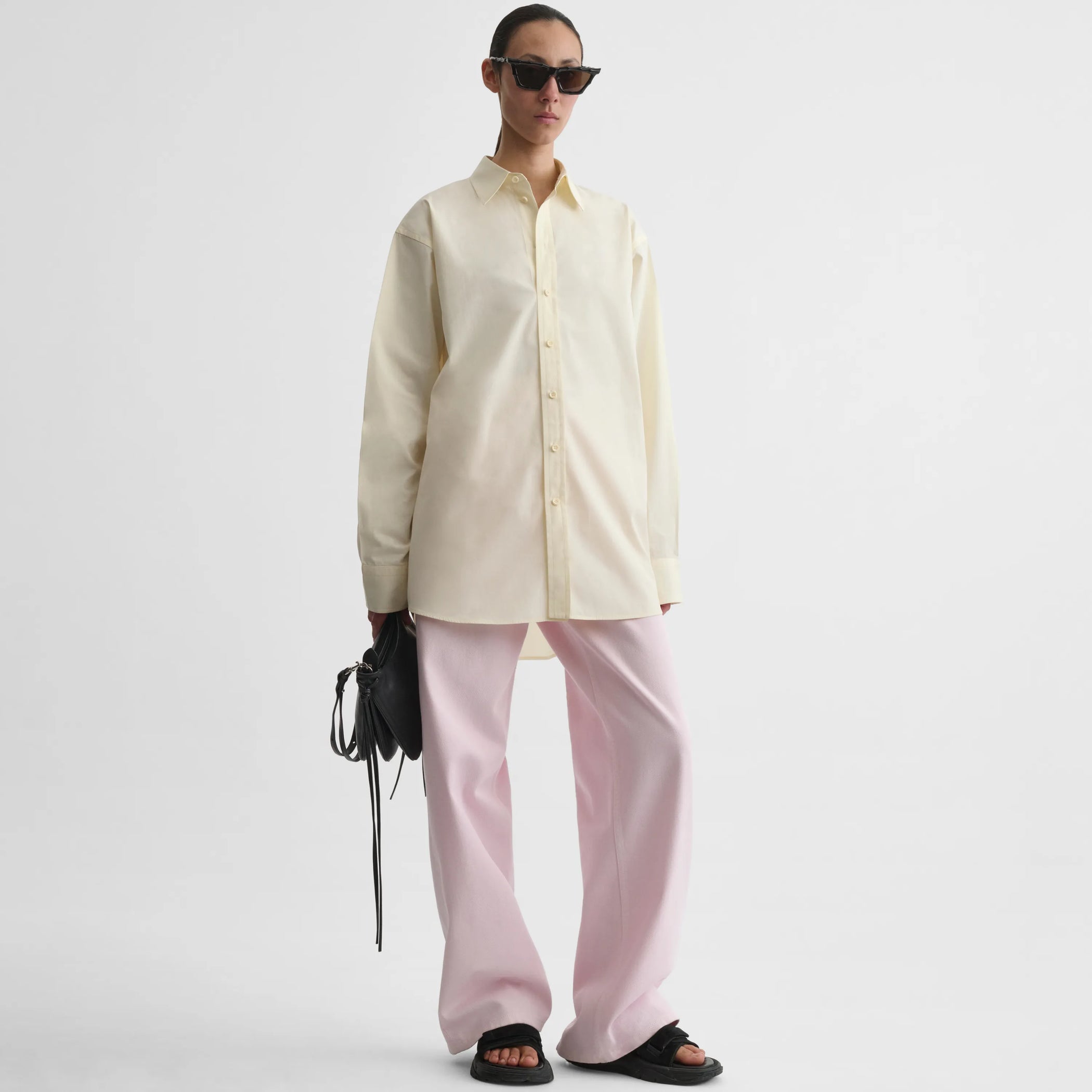 Front view of sharp collar shirt in light yellow cotton