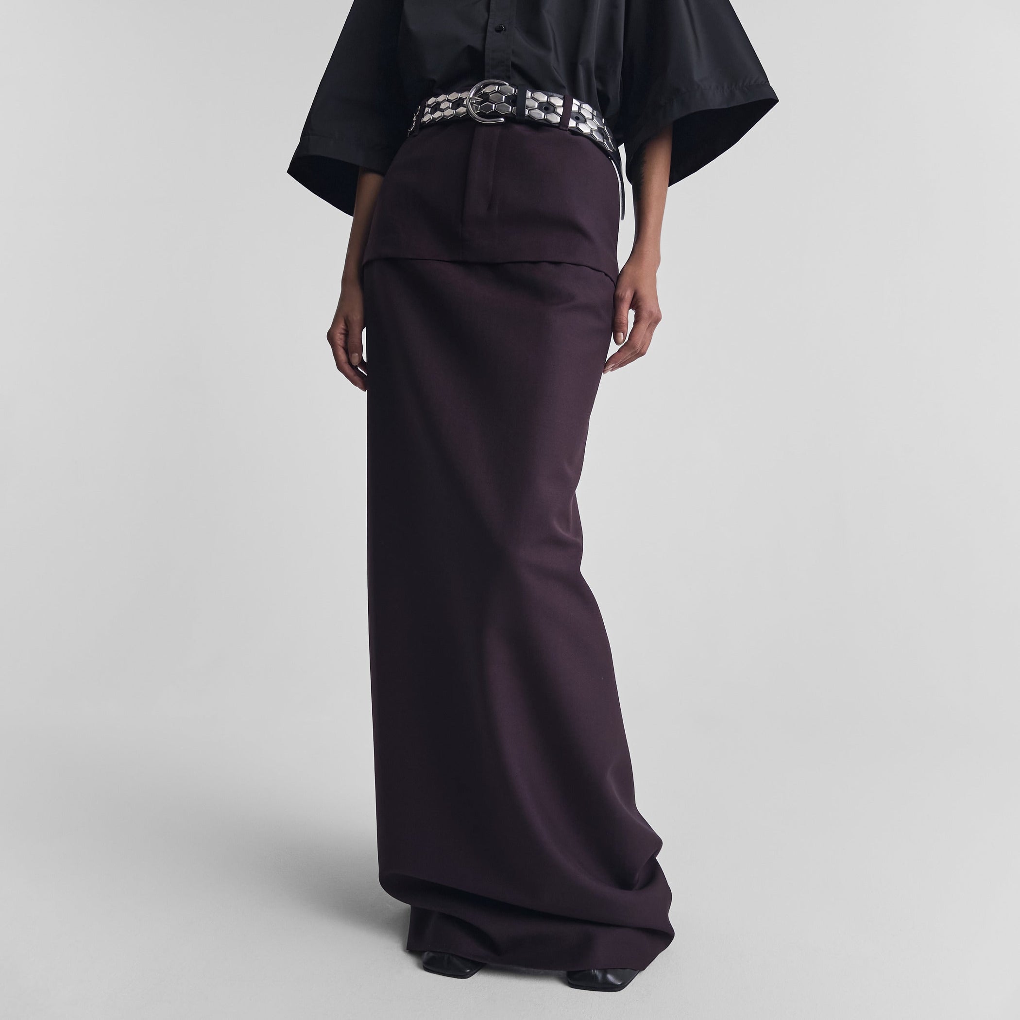 Front view of model wearing HIGH SLIT TAILORED COLUMN SKIRT in berry wool