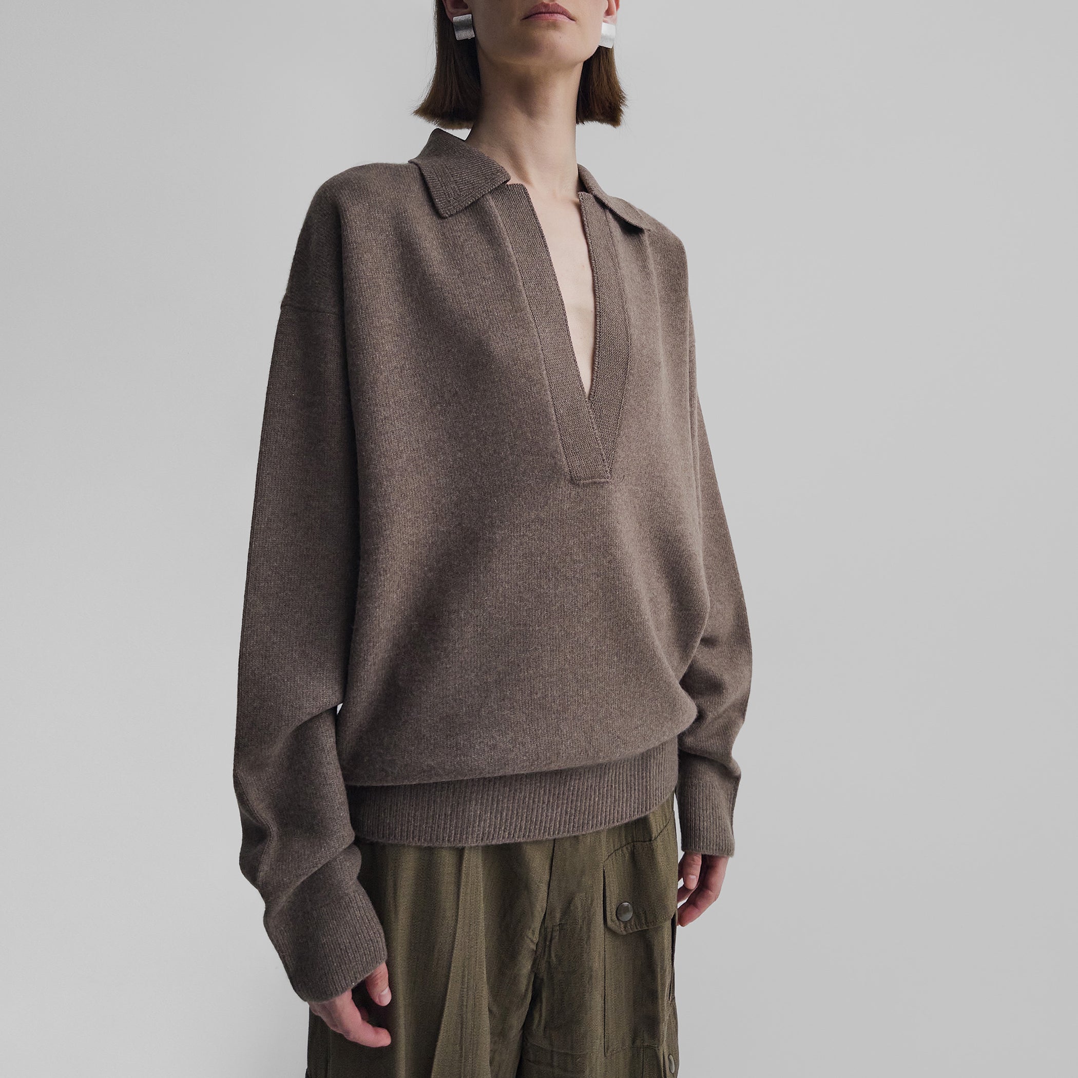 Front view of model wearing SOFT SHIRT COLLAR JUMPER in dun