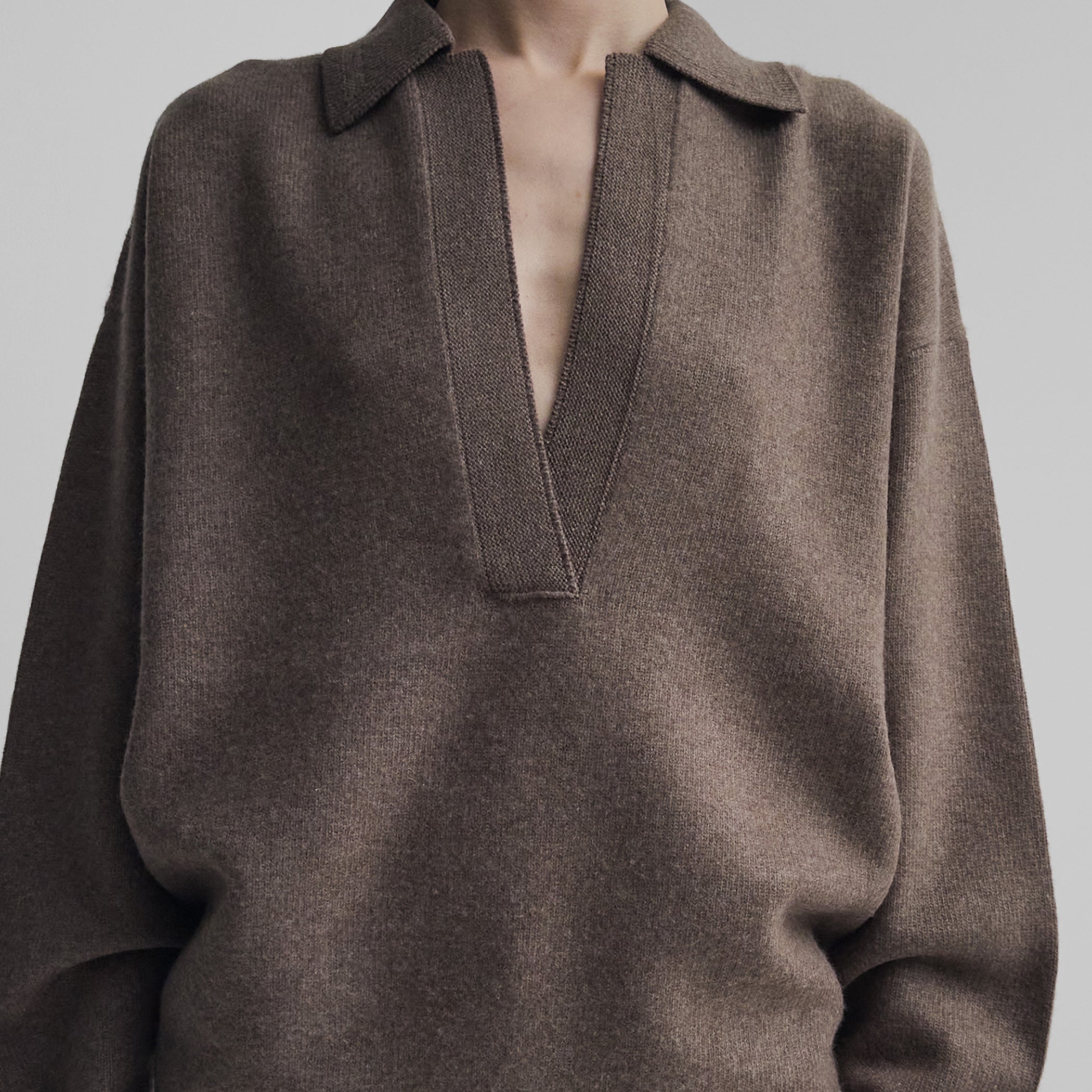 Front detail view of model wearing SOFT SHIRT COLLAR JUMPER in dun