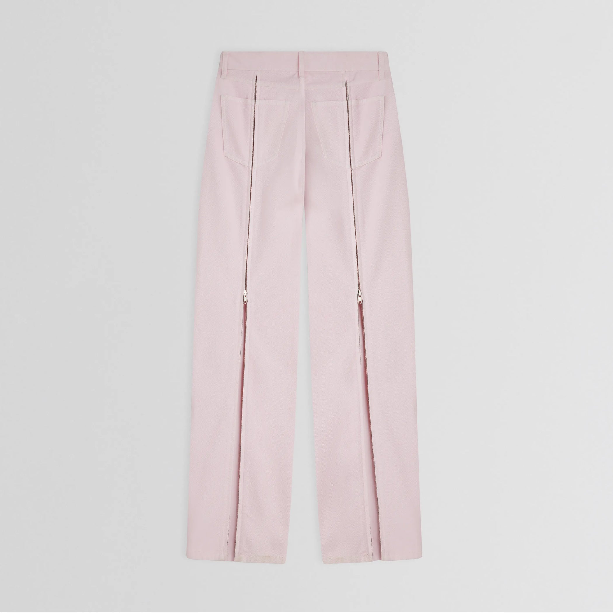 Flat back view of zip jeans in pale pink cotton