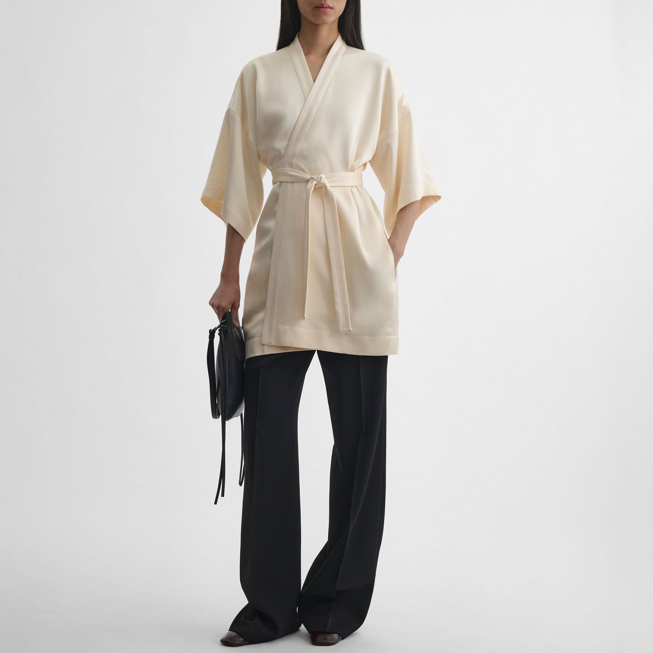 Front view of model wearing CROPPED ROBE DRESS in cream viscose