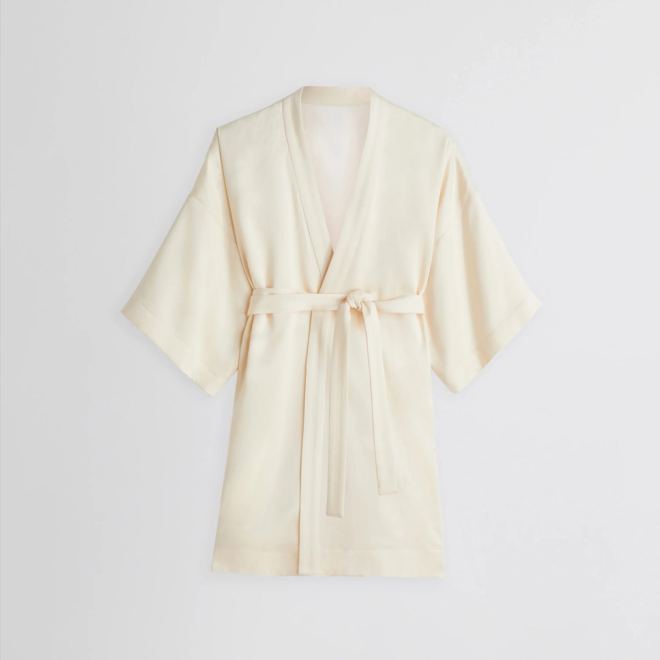 Flat front view of CROPPED ROBE DRESS in cream viscose