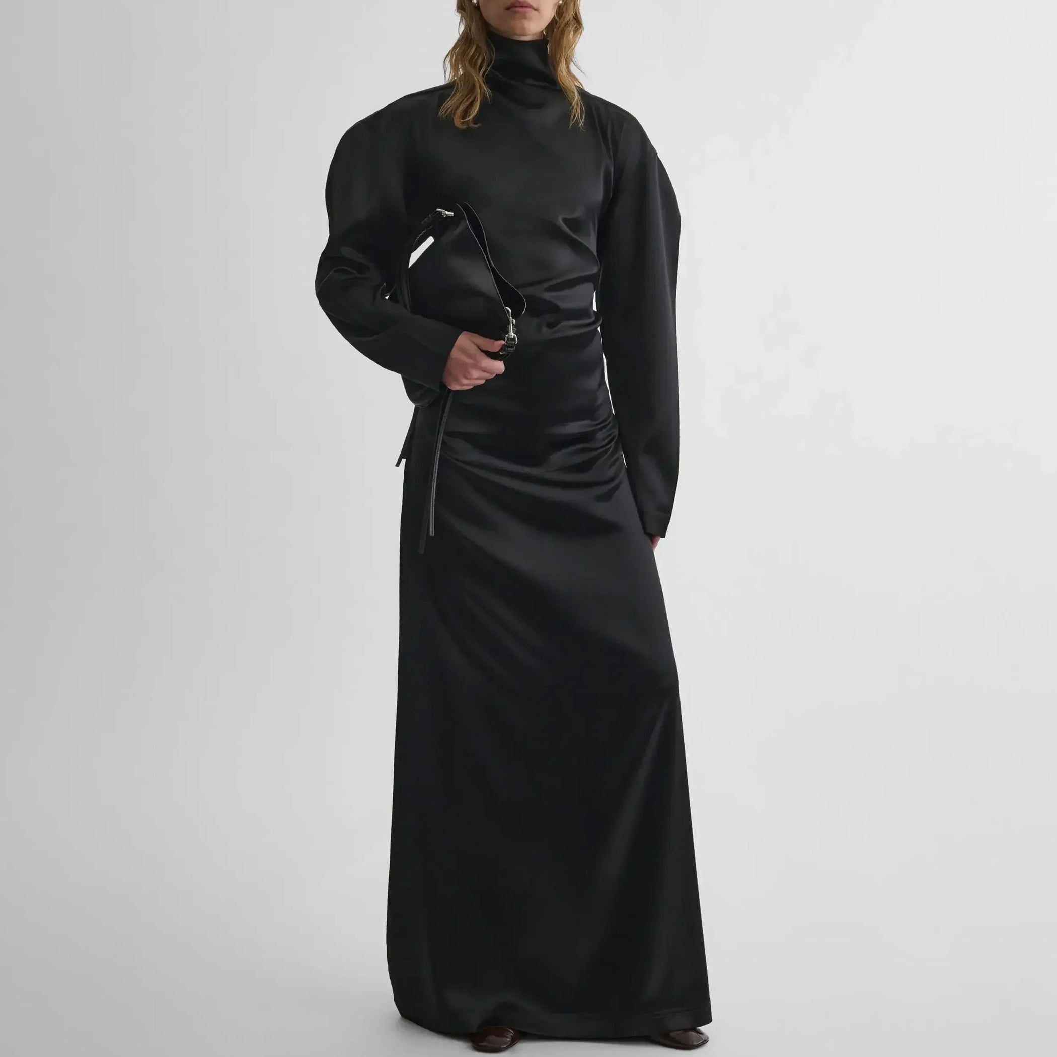 Front view of model wearing LIQUID OPEN BACK DRESS in black silk satin