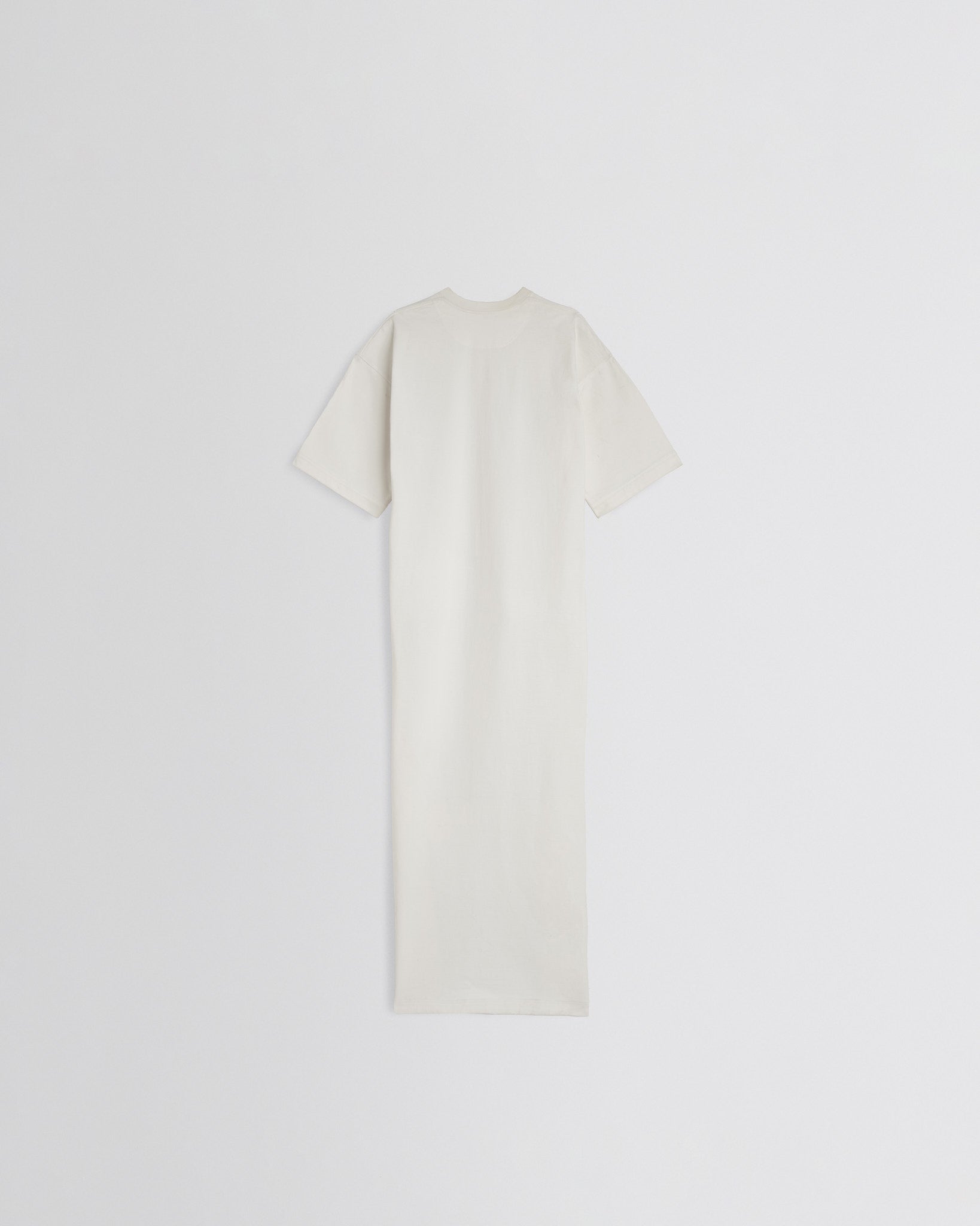 Back view of t-shirt train top in white jersey