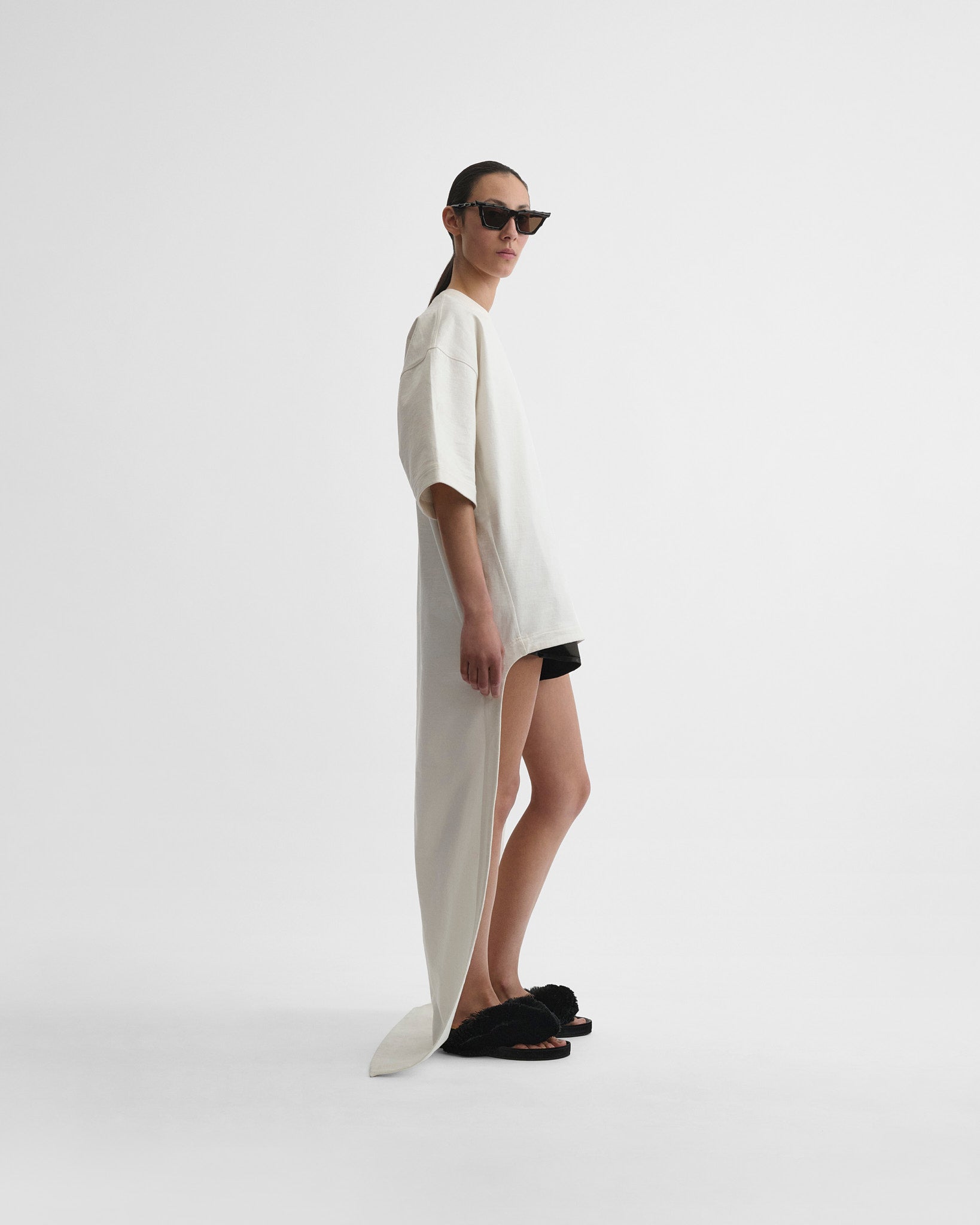 Side view of t-shirt train top in white jersey