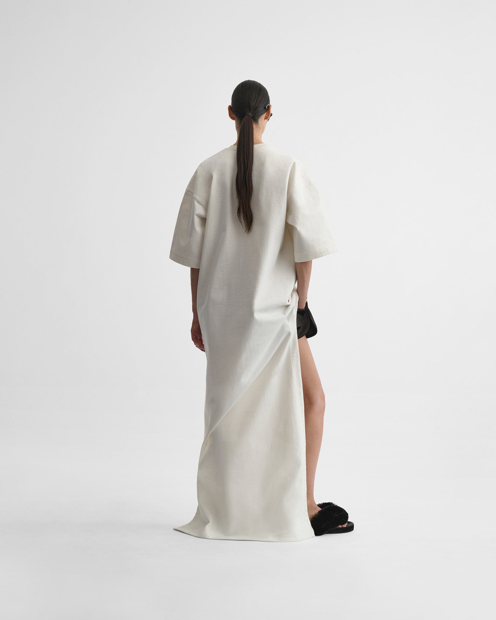 Back view of t-shirt train top in white jersey