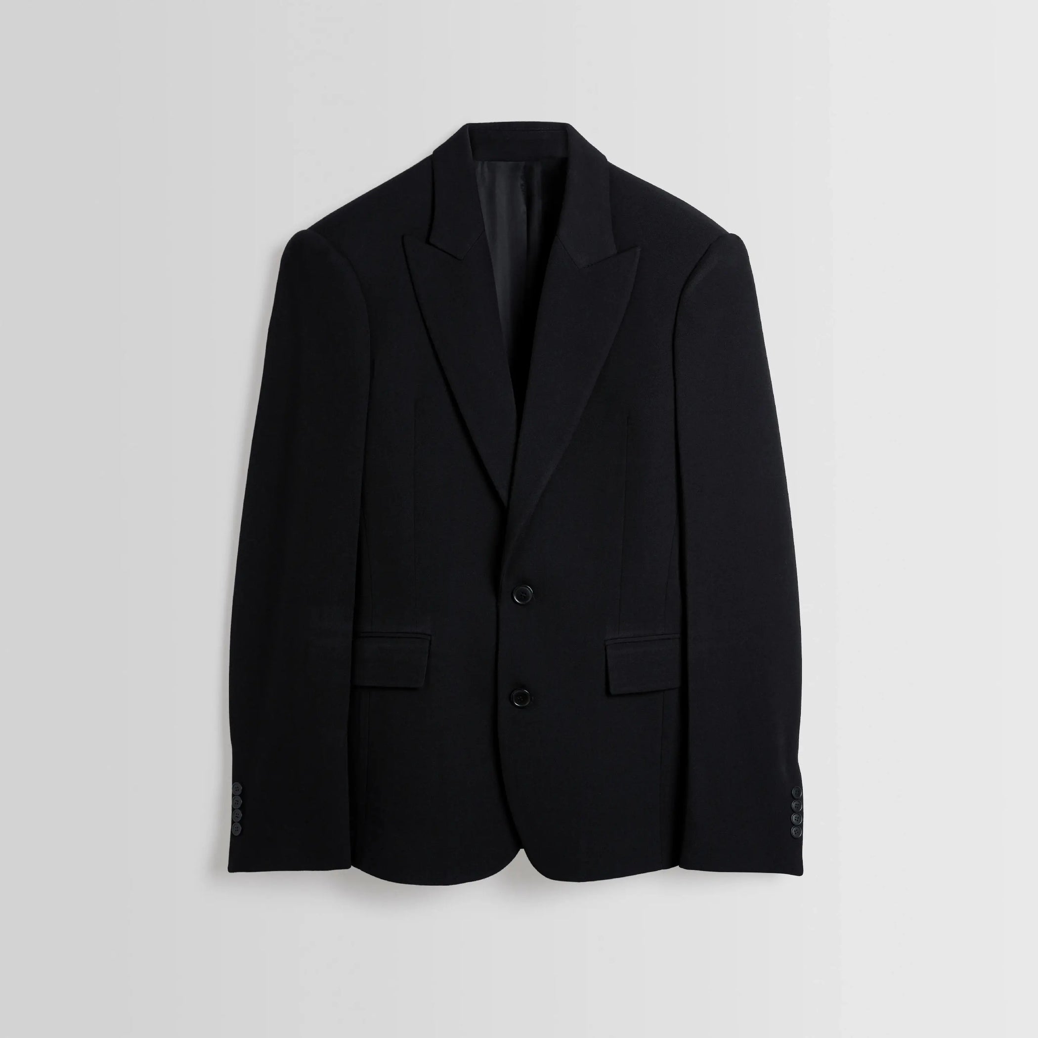 Front flat lay of Single Breasted Tailored Jacket in black. 