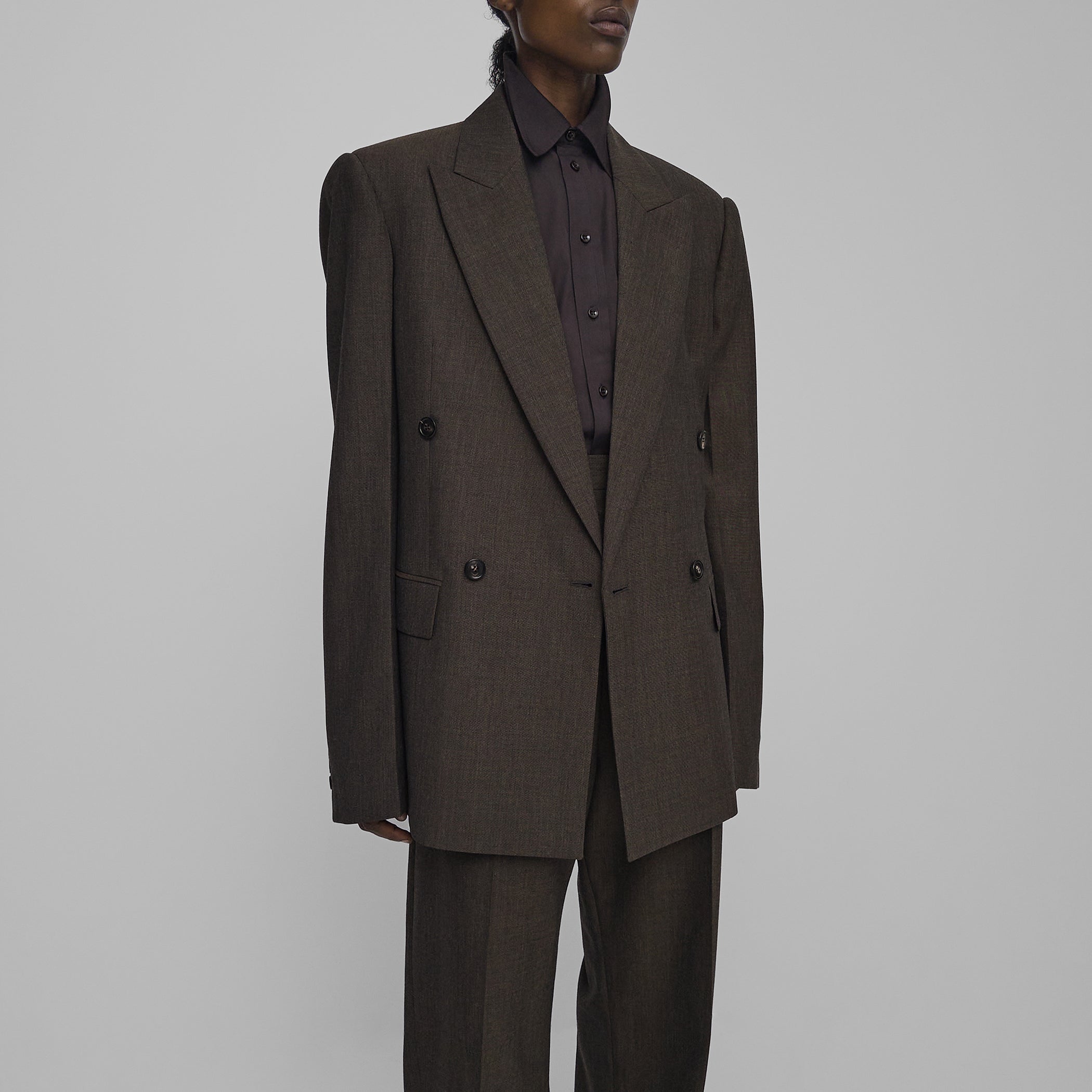 Angled front view of model wearing MILANESE JACKET in cigar