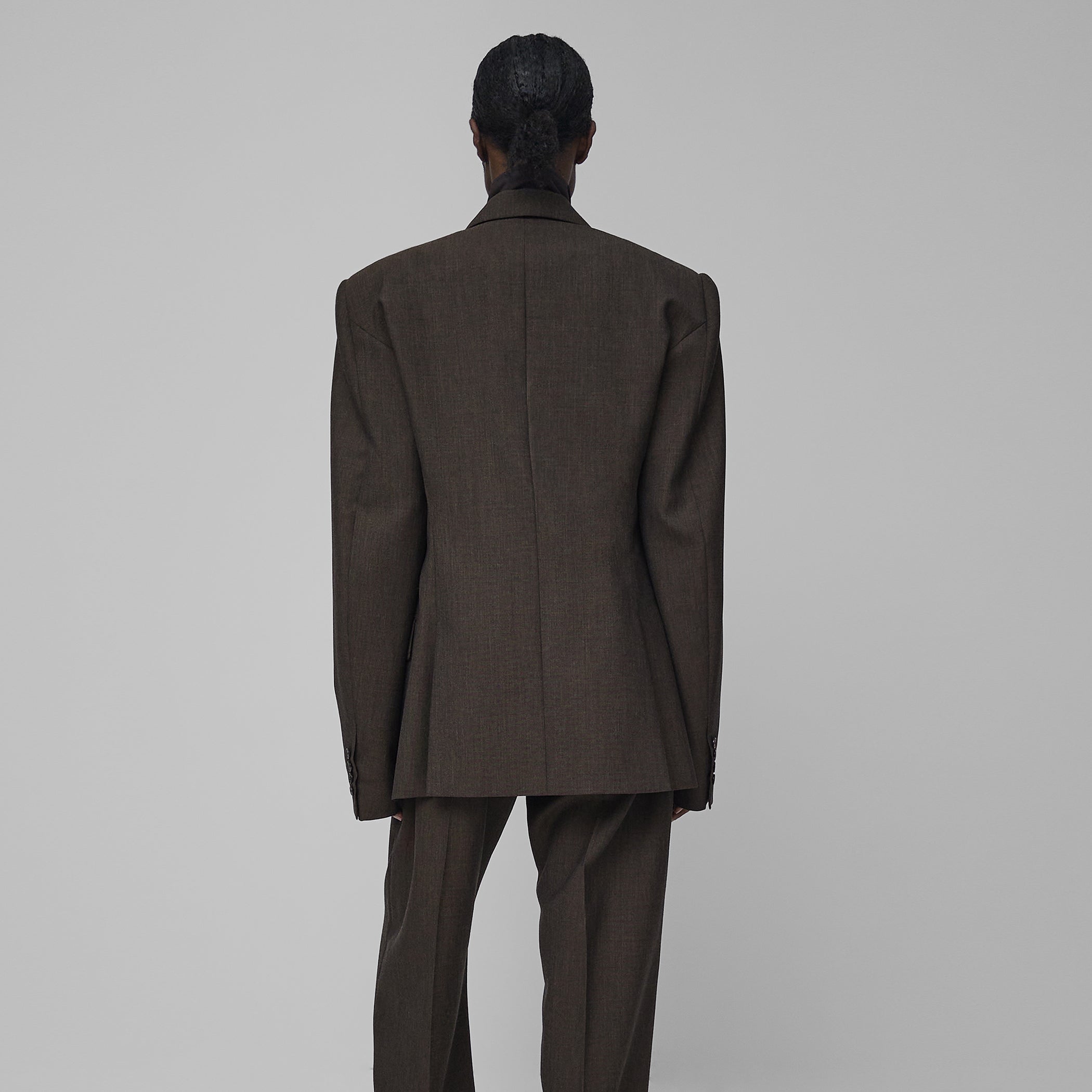 Back view of model wearing MILANESE JACKET in cigar