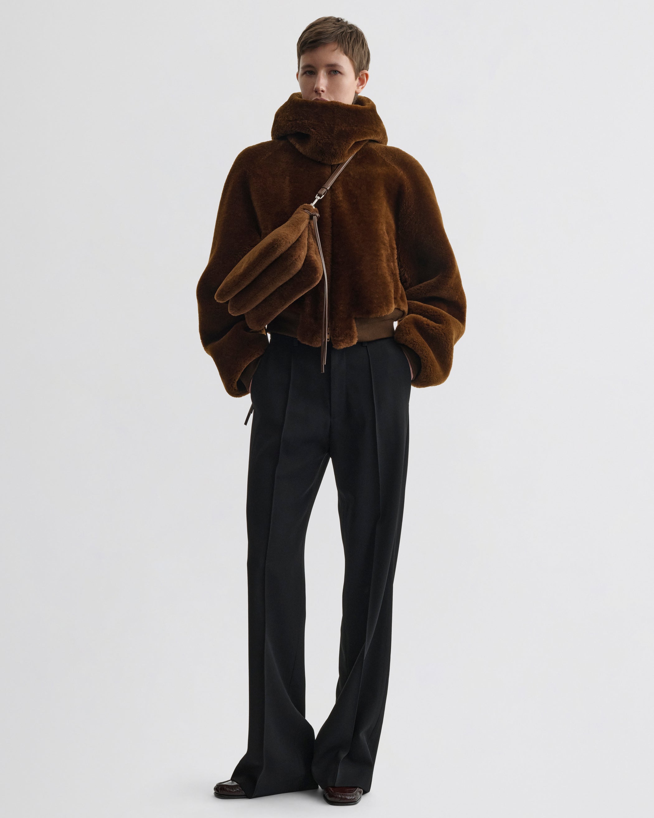 Full view of model wearing Super Soft Bomber Jacket in ginger shearling