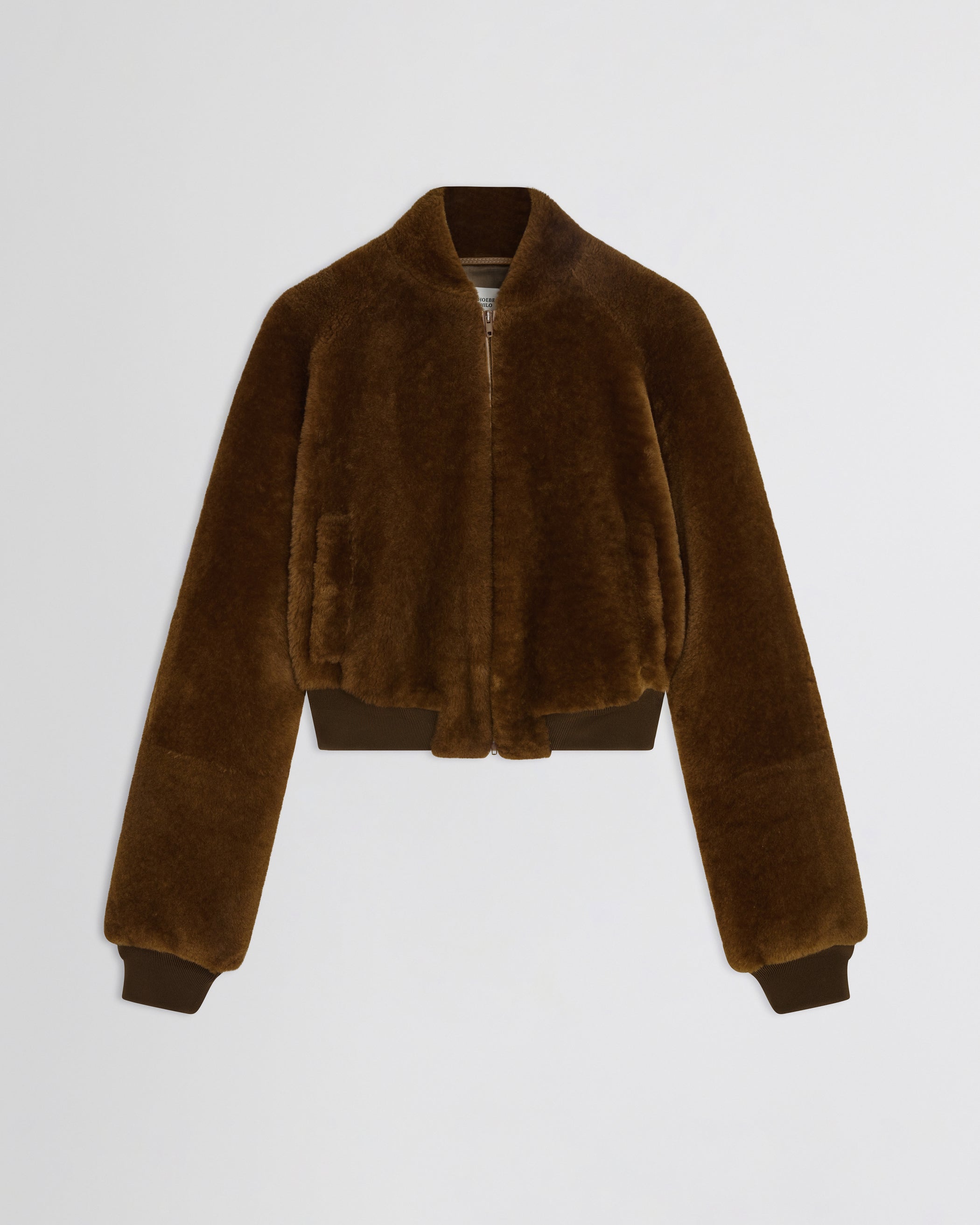 Flat front view of Super Soft Bomber Jacket in ginger shearling