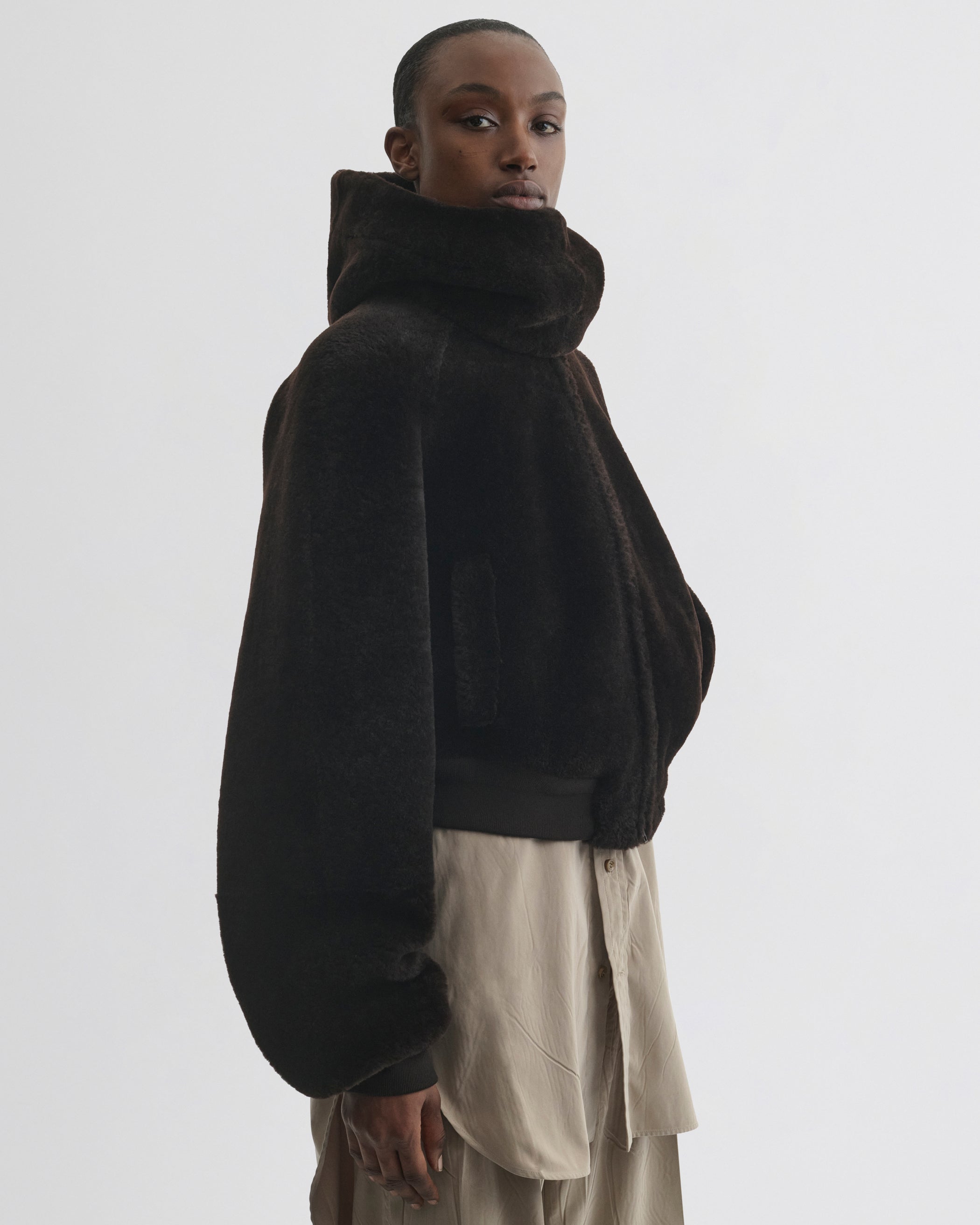 Side view of Super Soft Bomber Jacket in deep brown shearling