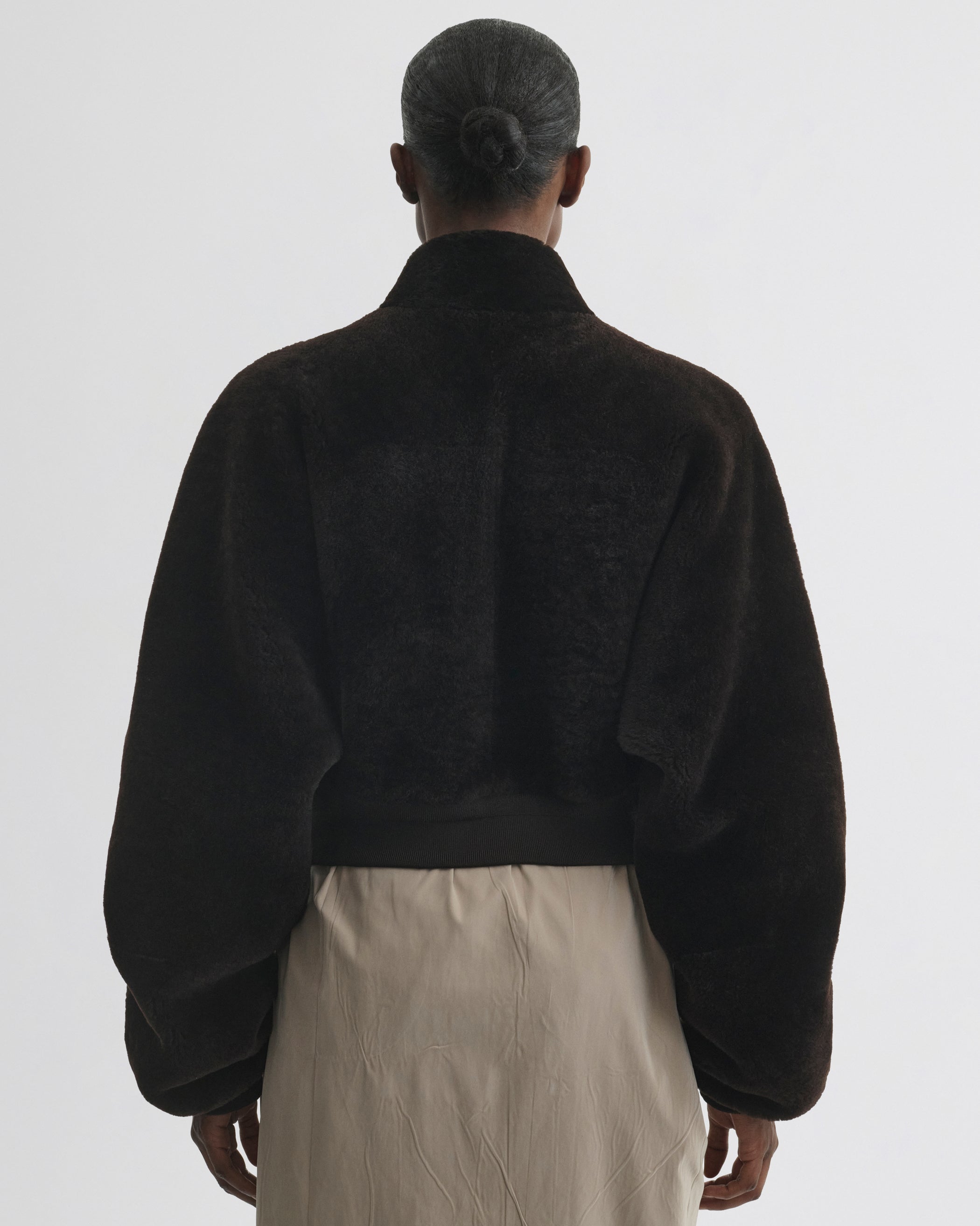 Back view of Super Soft Bomber Jacket in deep brown shearling