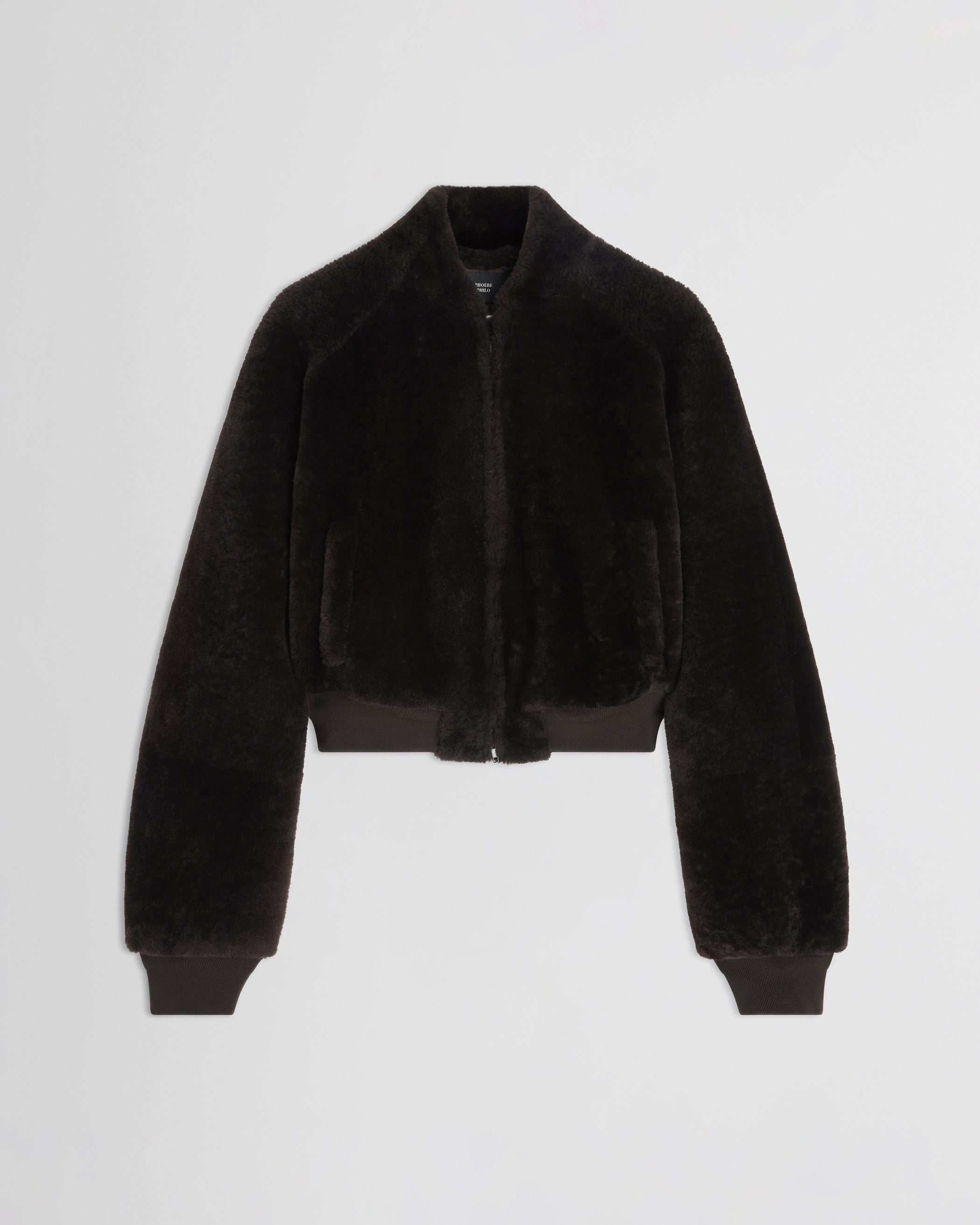 Flat front view of Super Soft Bomber Jacket in deep brown shearling