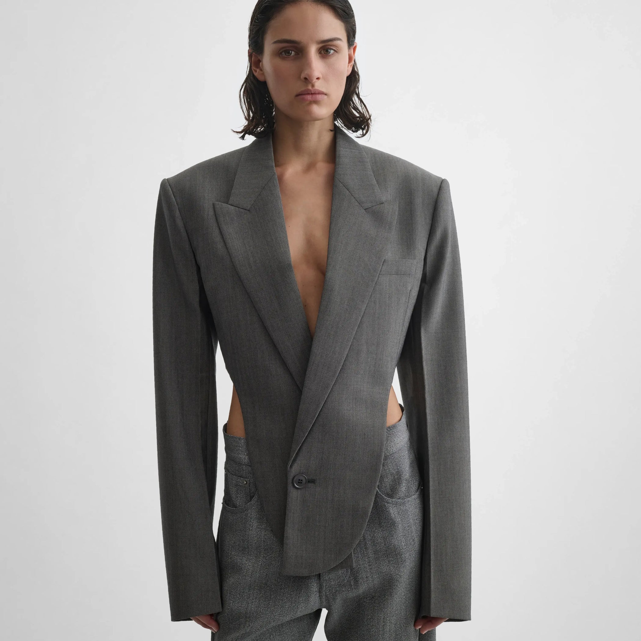 Front view of model wearing Tucked Tailored Jacket in dark taupe.