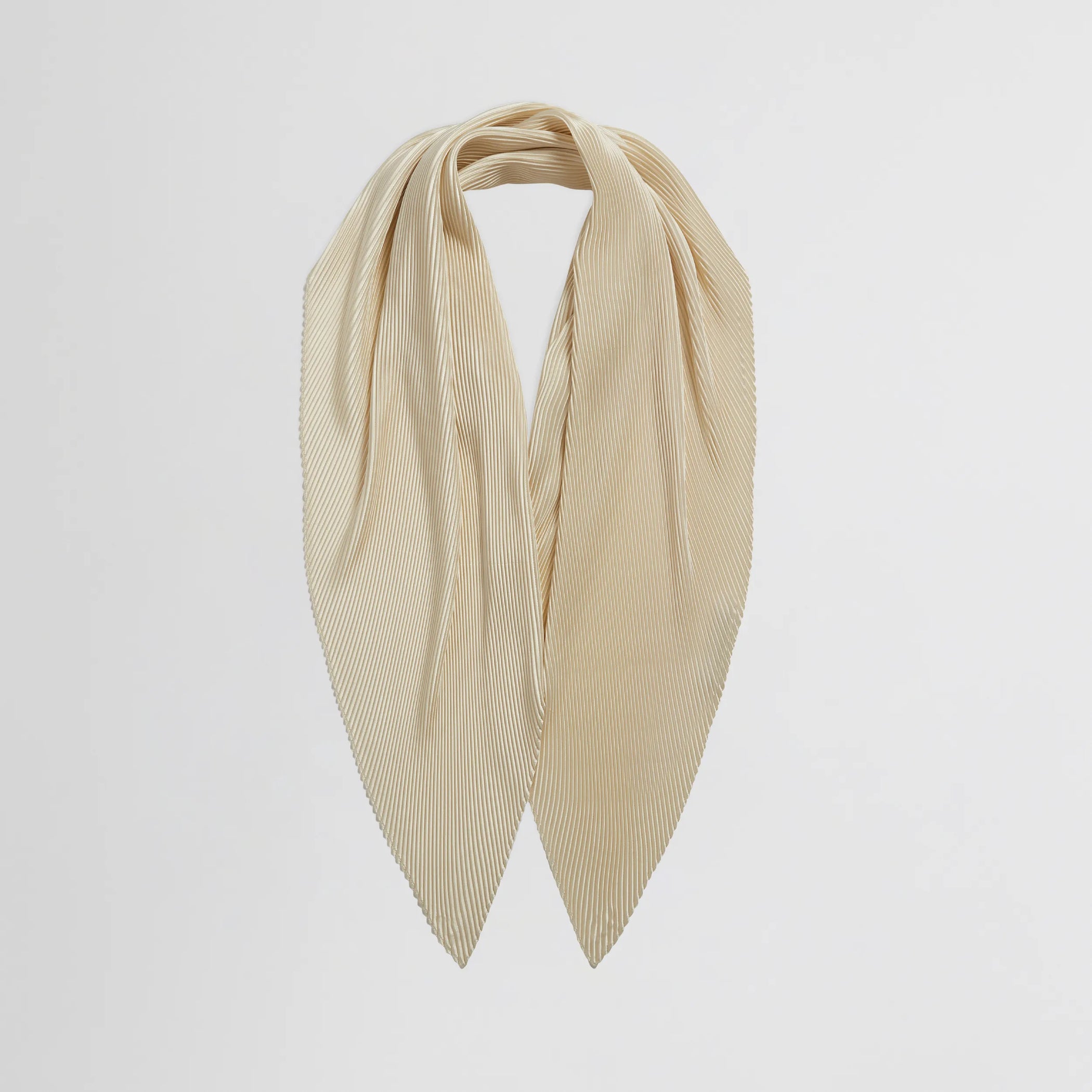 Flat front view of woven pleated scarf in cream silk