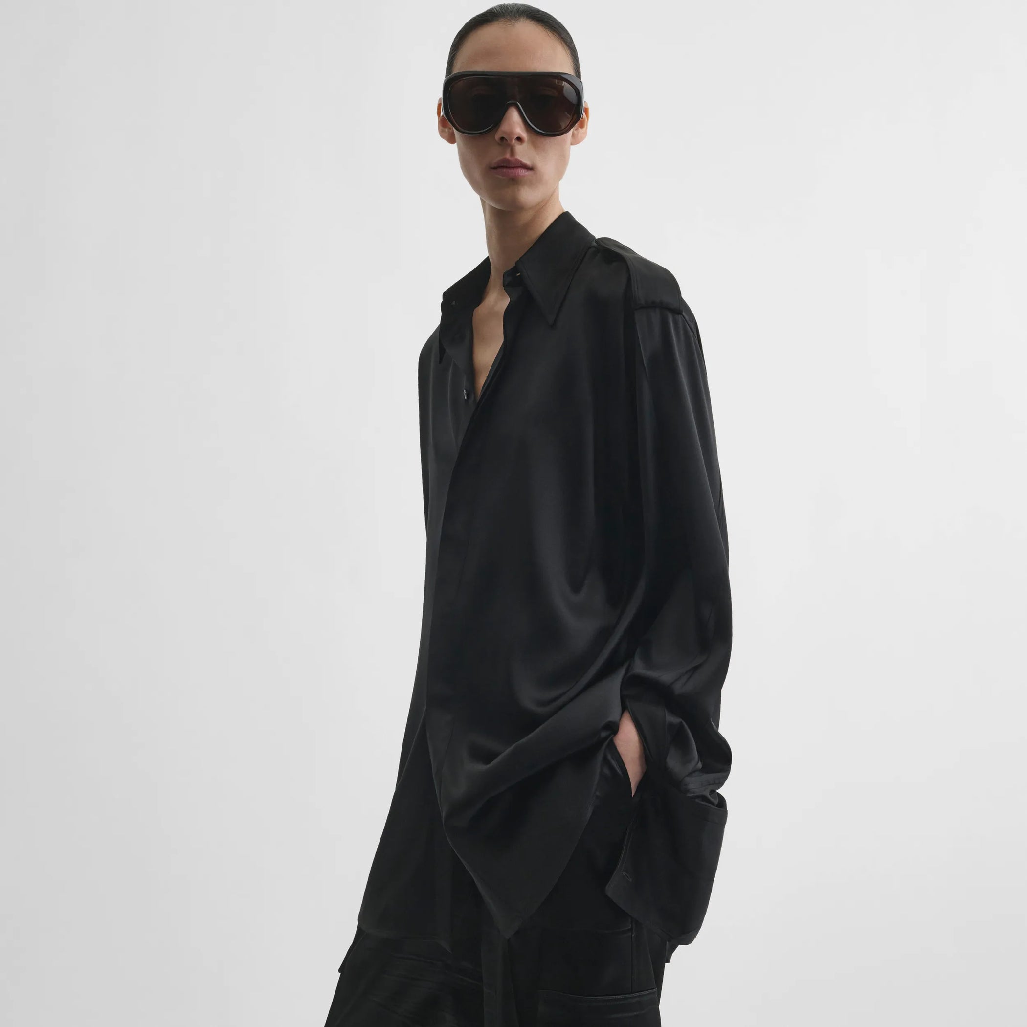 Side model view of liquid utility shirt in black silk satin
