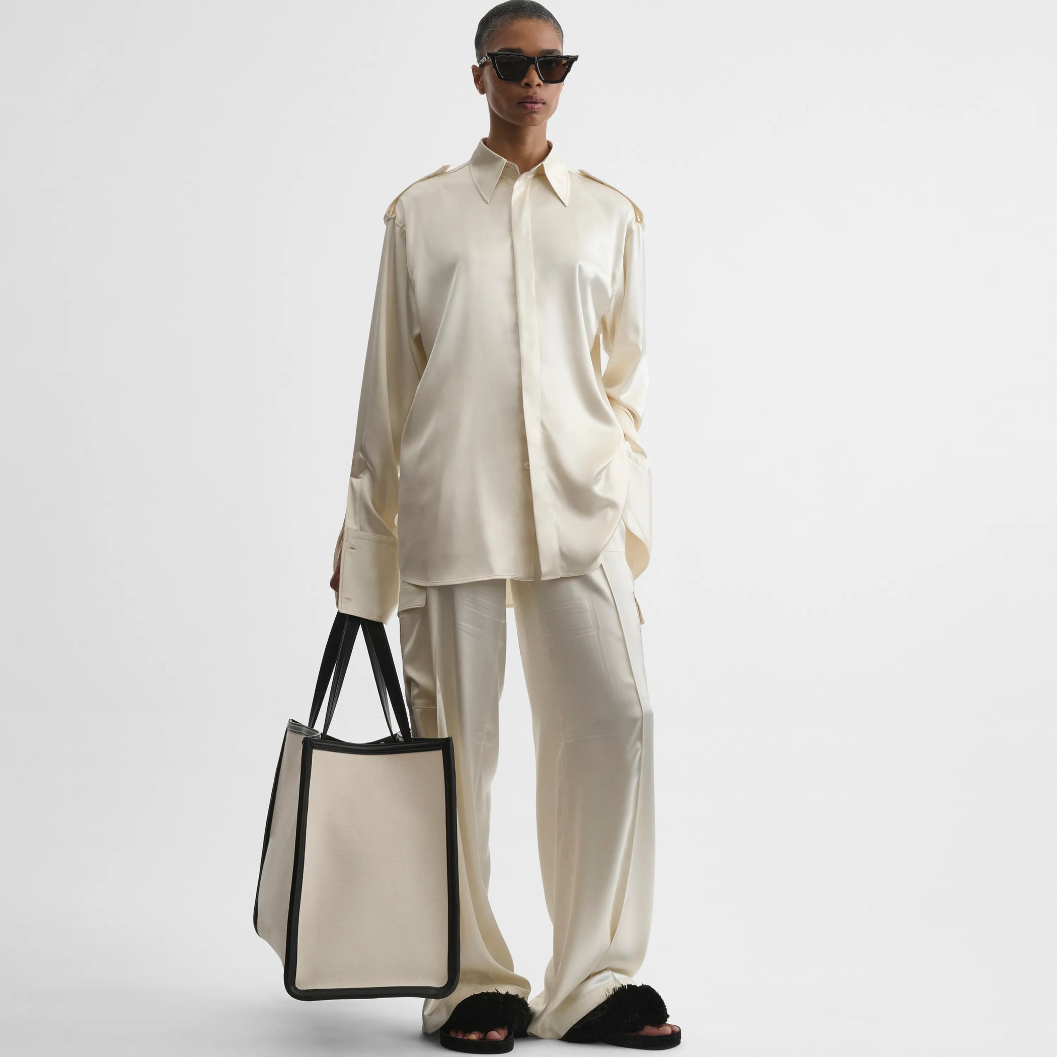 Front view of liquid utility shirt in cream silk