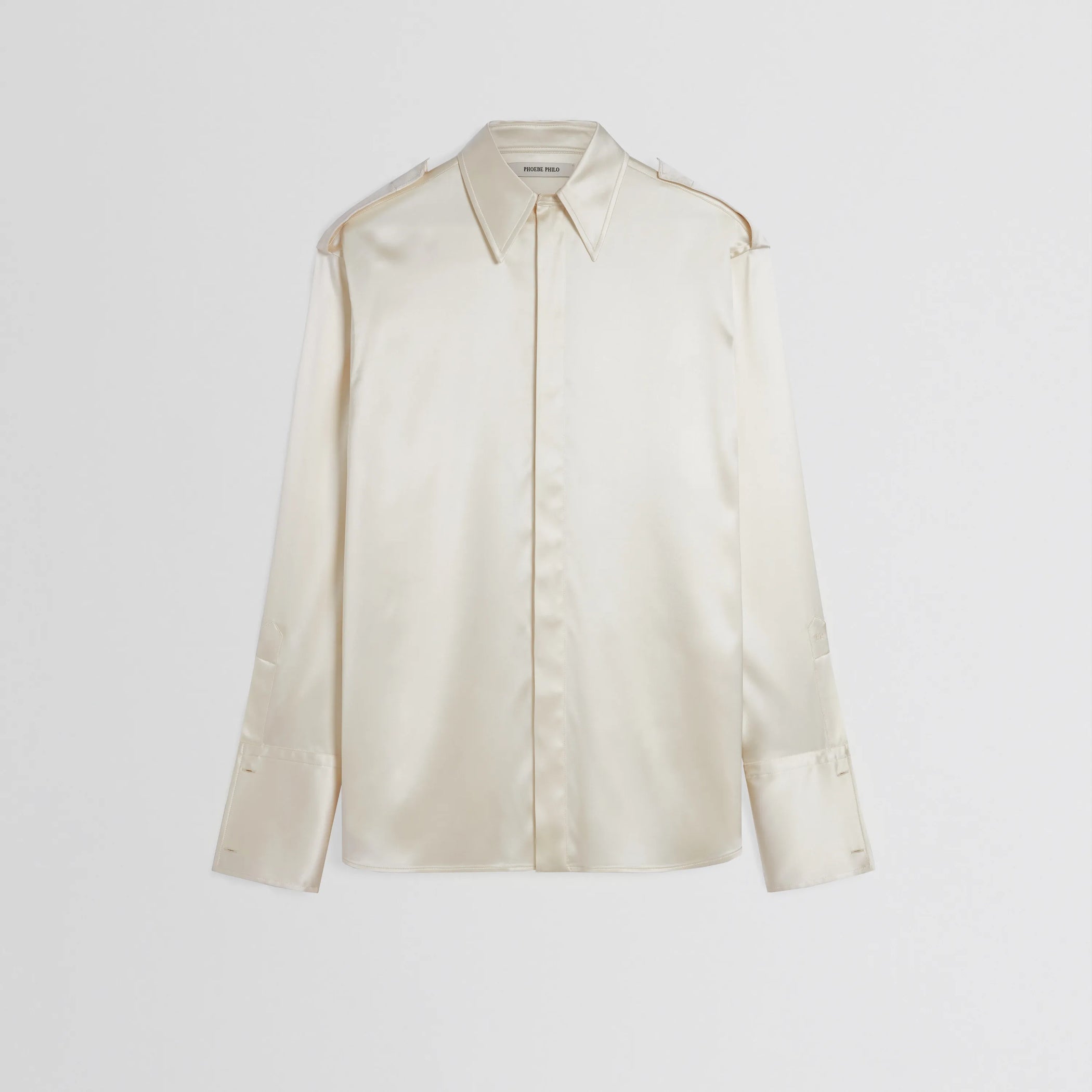 Flat front view of liquid utility shirt in cream silk 