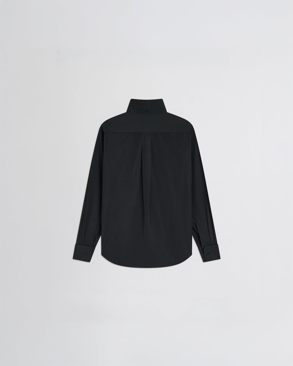 Flat back view of tuxedo shirt in black cotton.