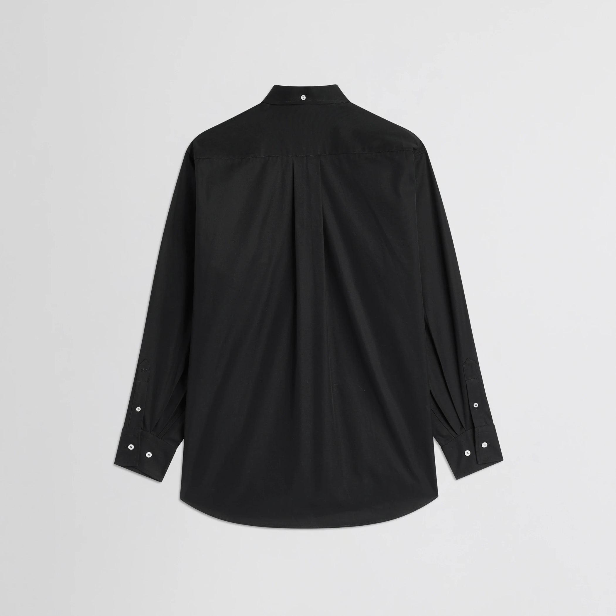 Flat back view of button collar shirt in black cotton.