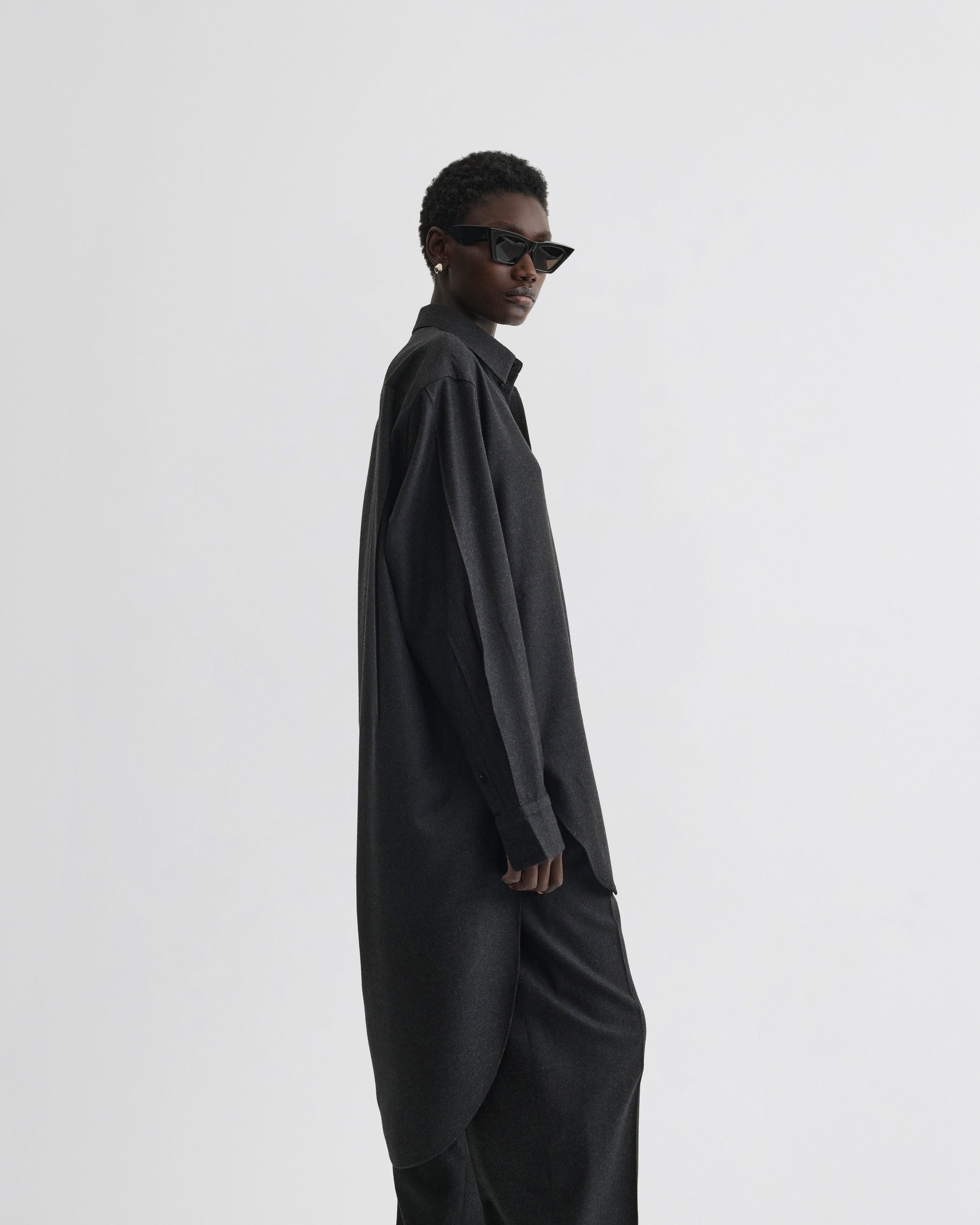 View of elongated shirt in charcoal wool