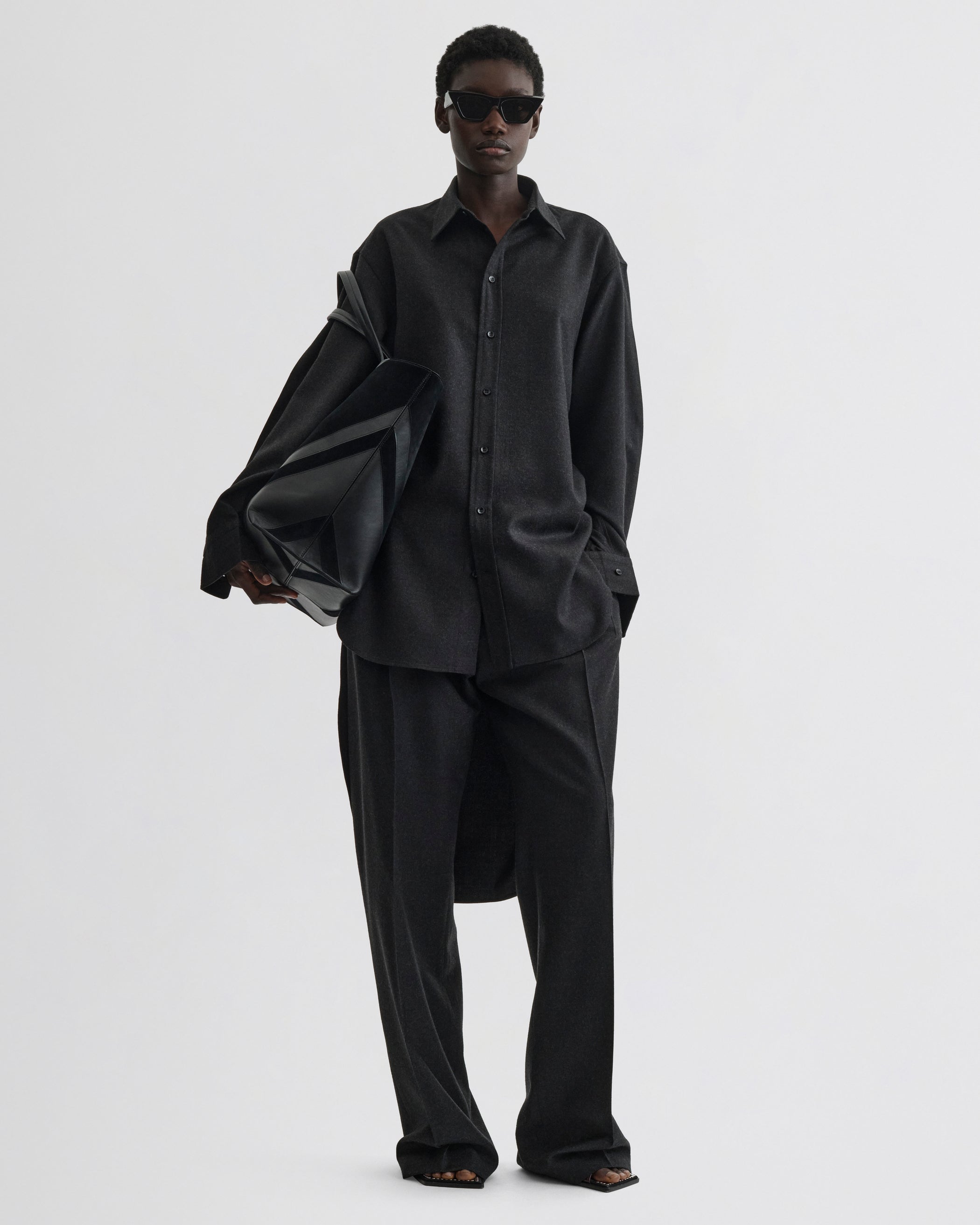 Front view of model wearing Elongated Shirt in charcoal wool