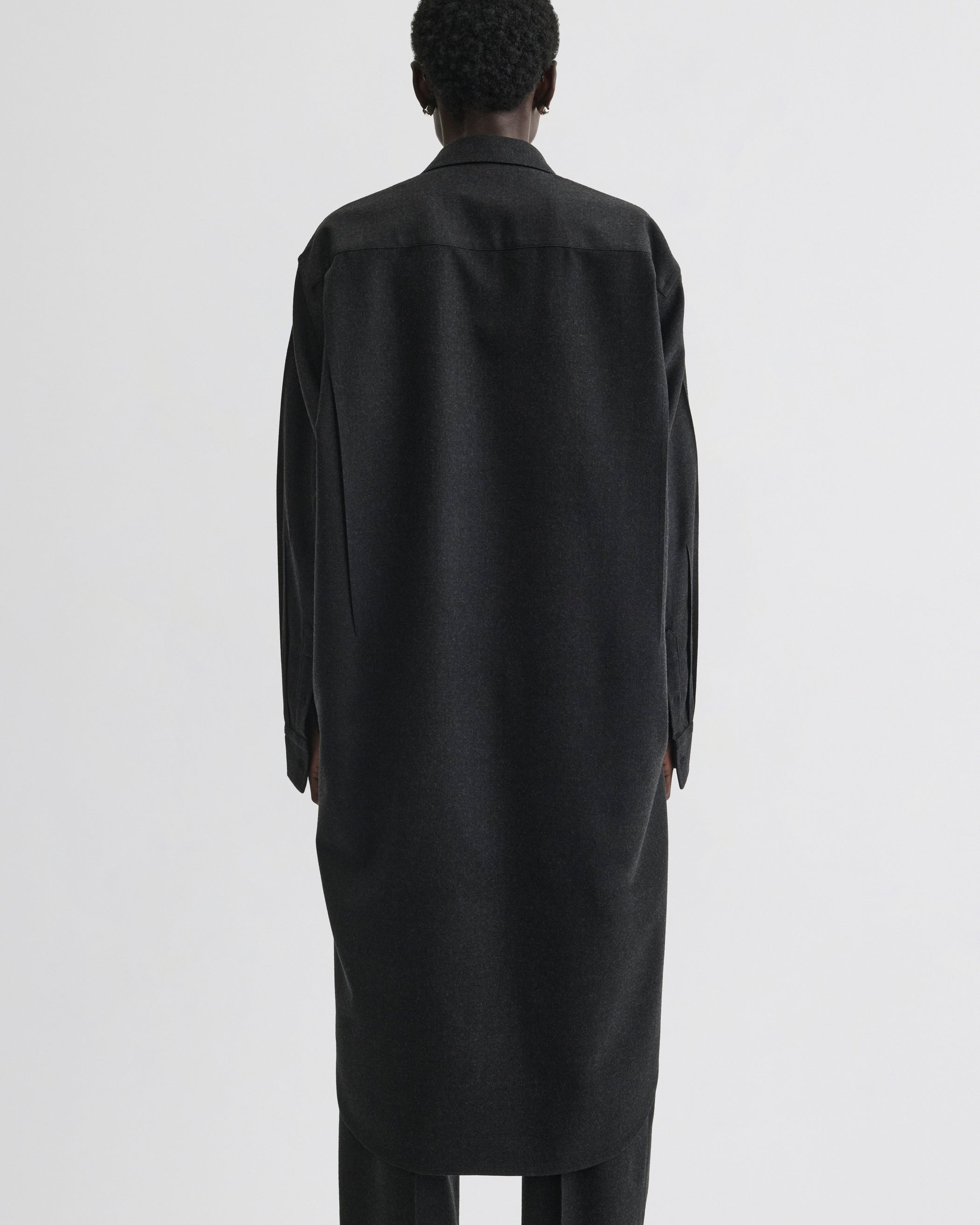 Back view of model wearing Elongated Shirt in charcoal wool