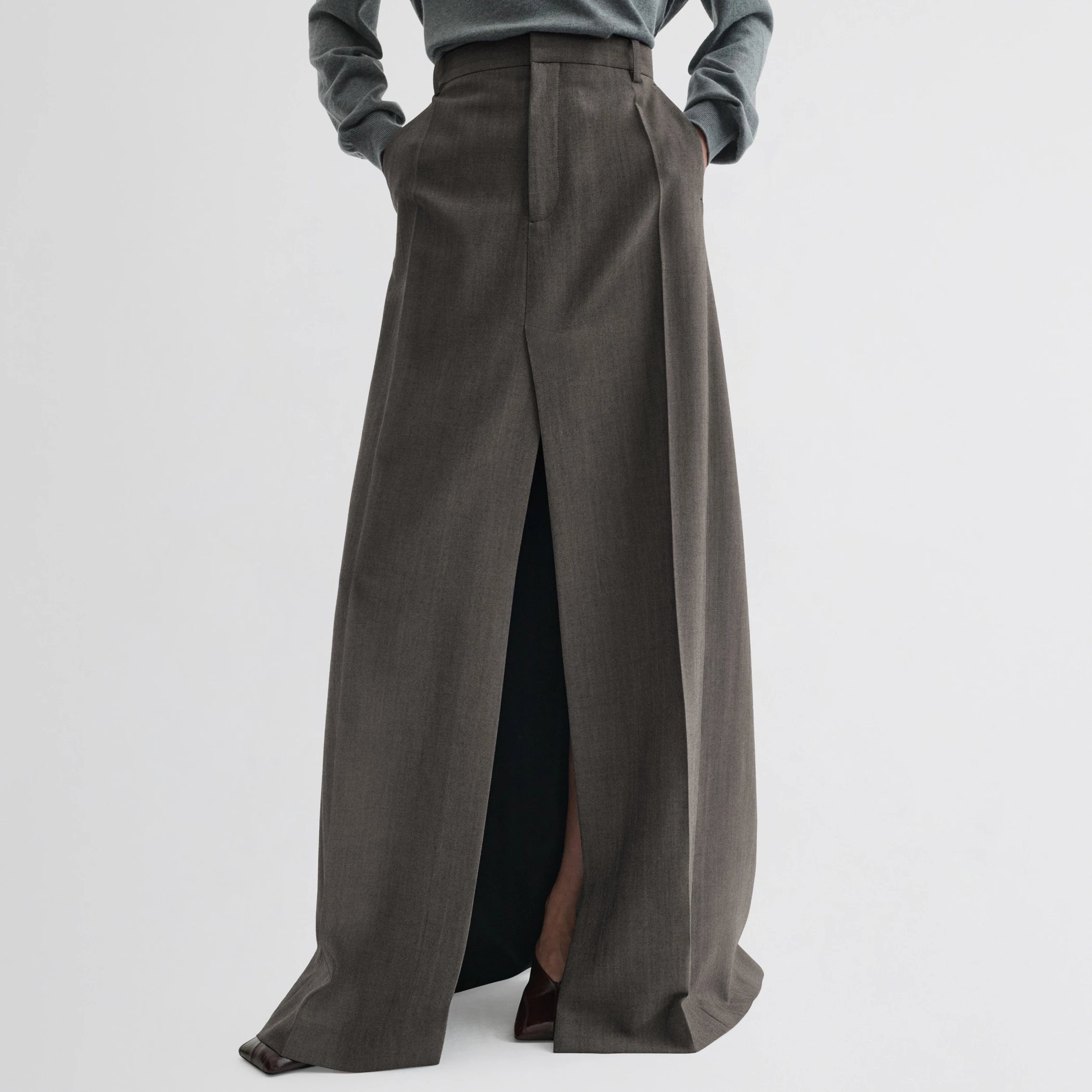Front view of double slit tailored skirt in dark taupe wool.
