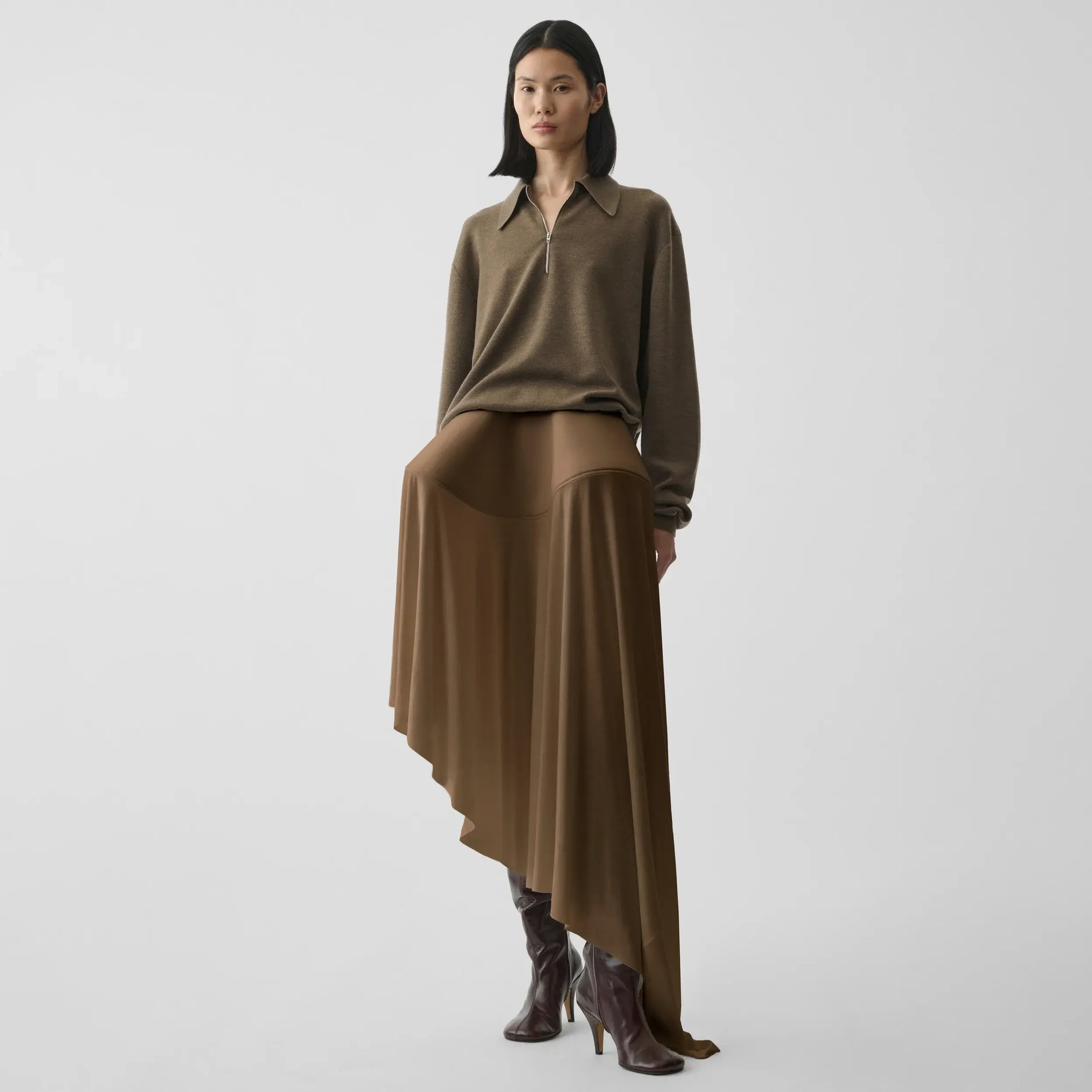 Flat front view of sculptural skirt in toffee jersey.