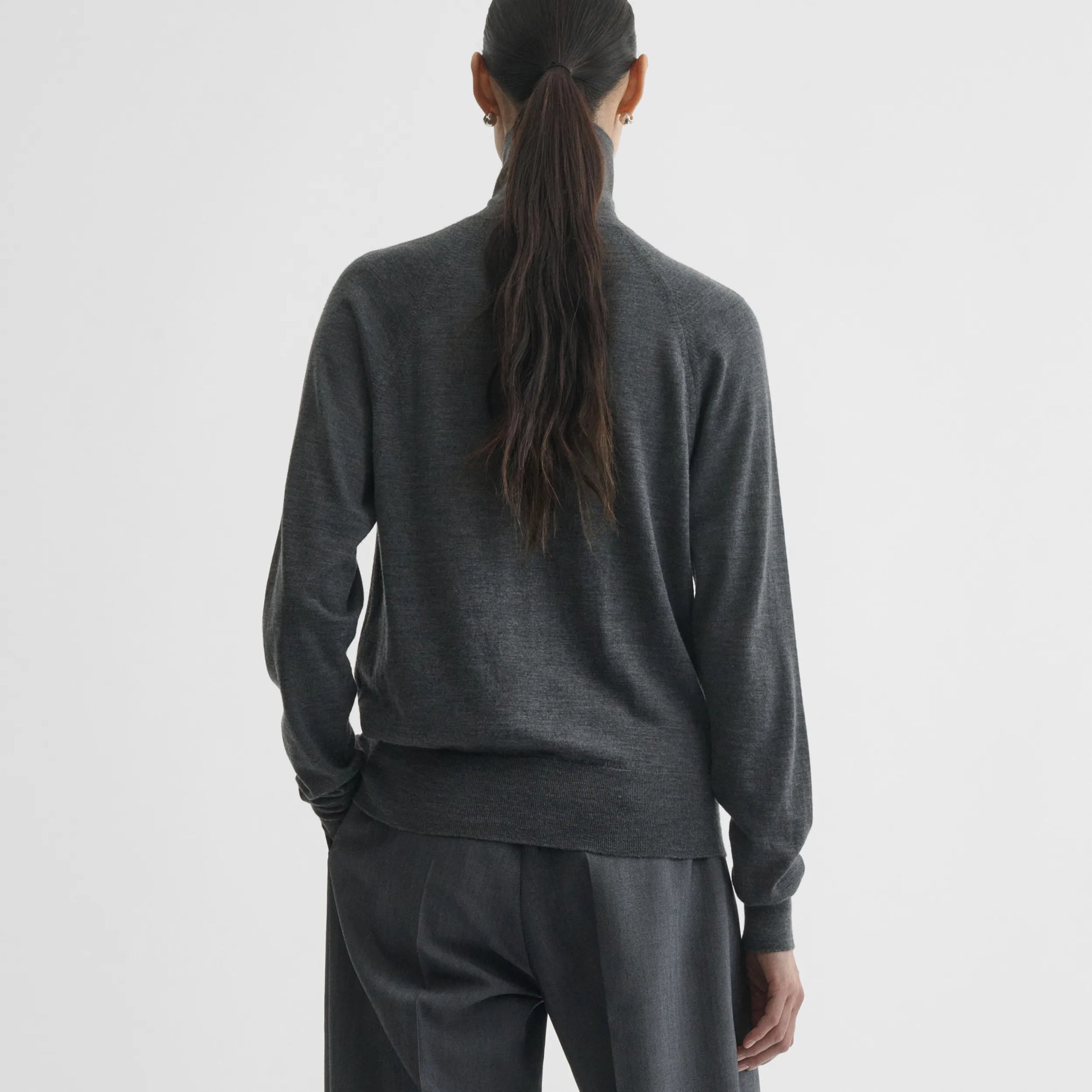 Back view of high neck jumper in anthracite-melange wool