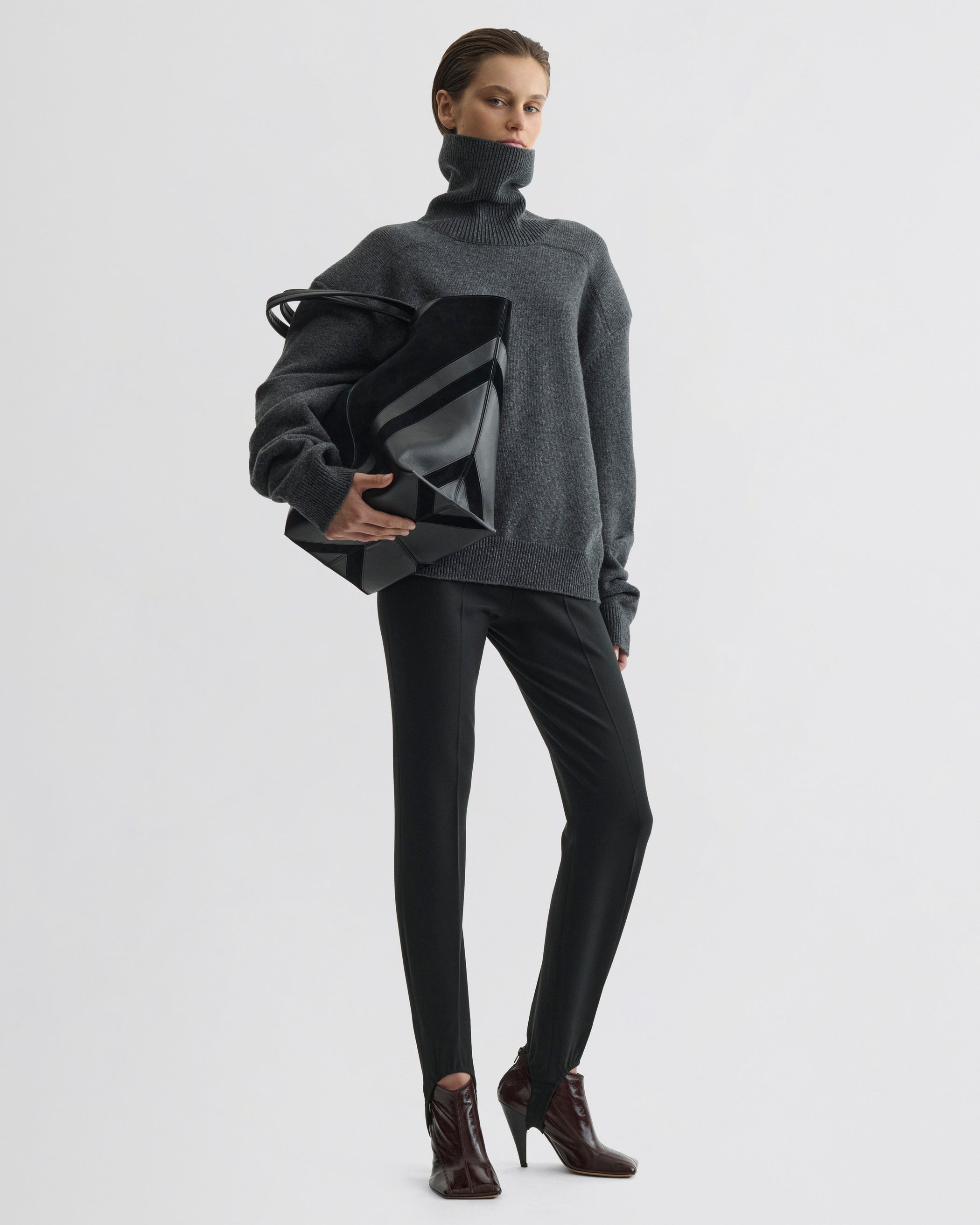 Full view of model wearing Patch Shoulder Jumper in grey melange wool cashmere