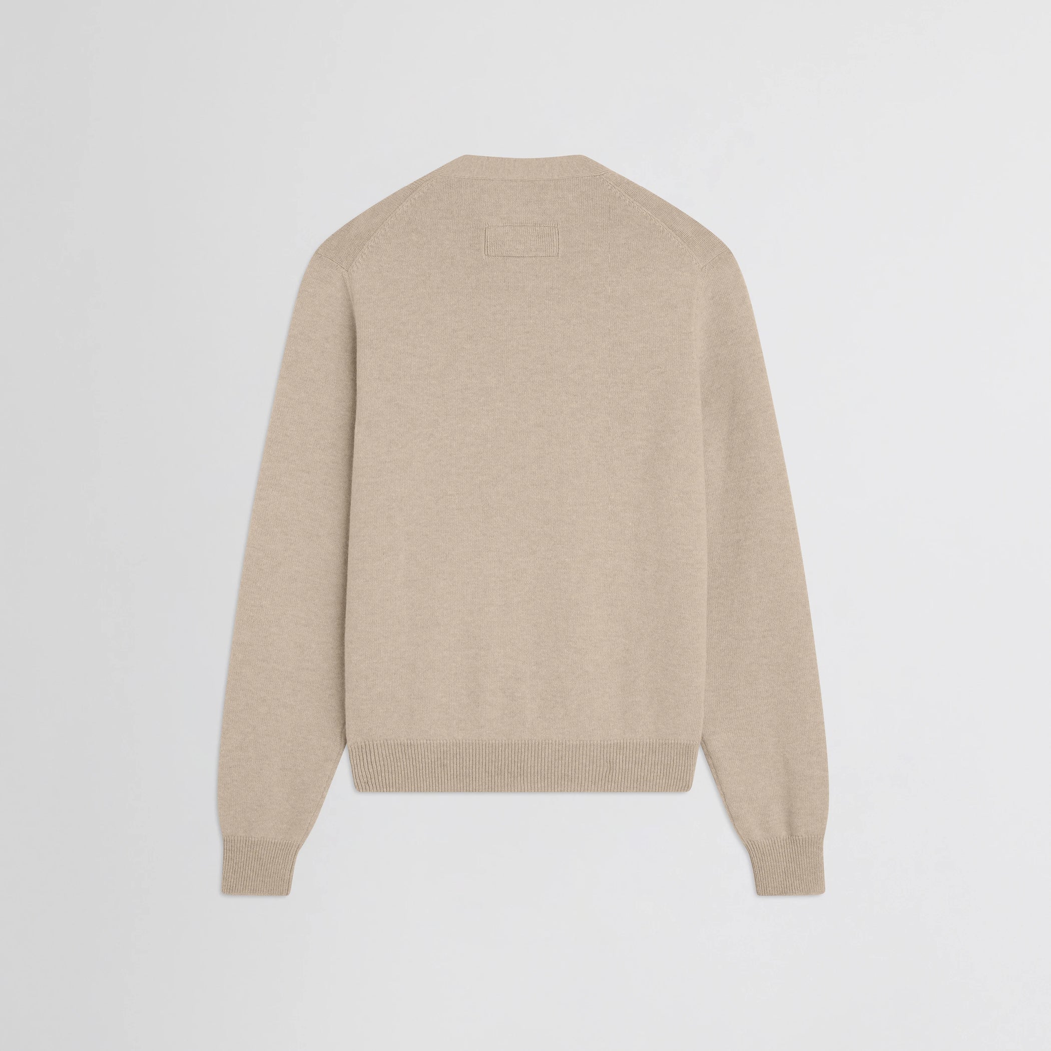 Flat back view of easy v-neck sweater in beige wool cashmere