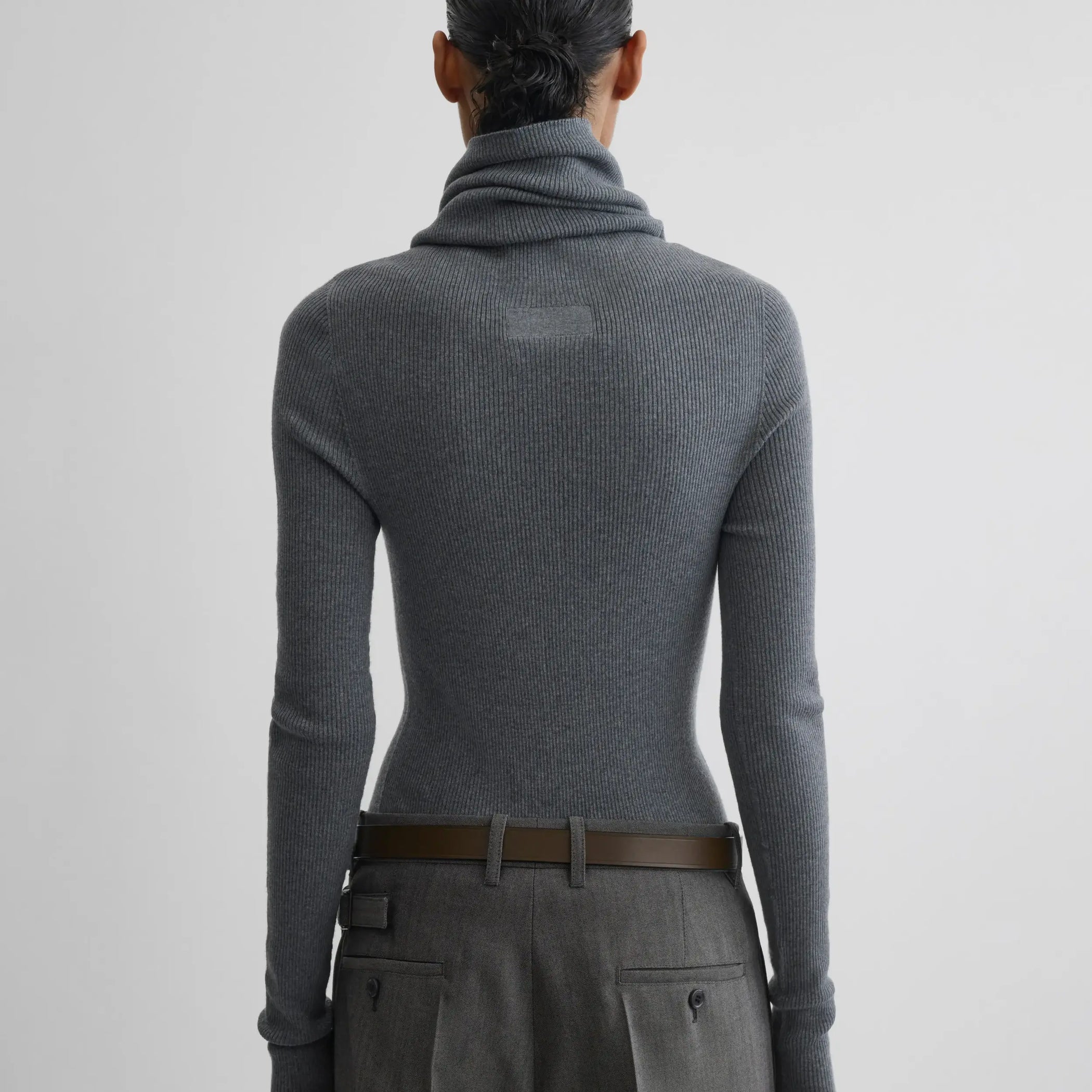Back view of model wearing FOLDOVER TOP in melange grey wool