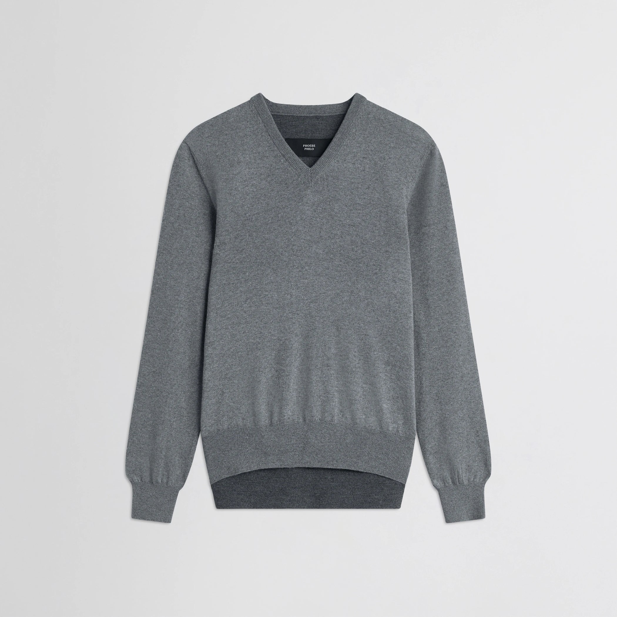 Flat front view of backed v-neck sweater in light grey wool.
