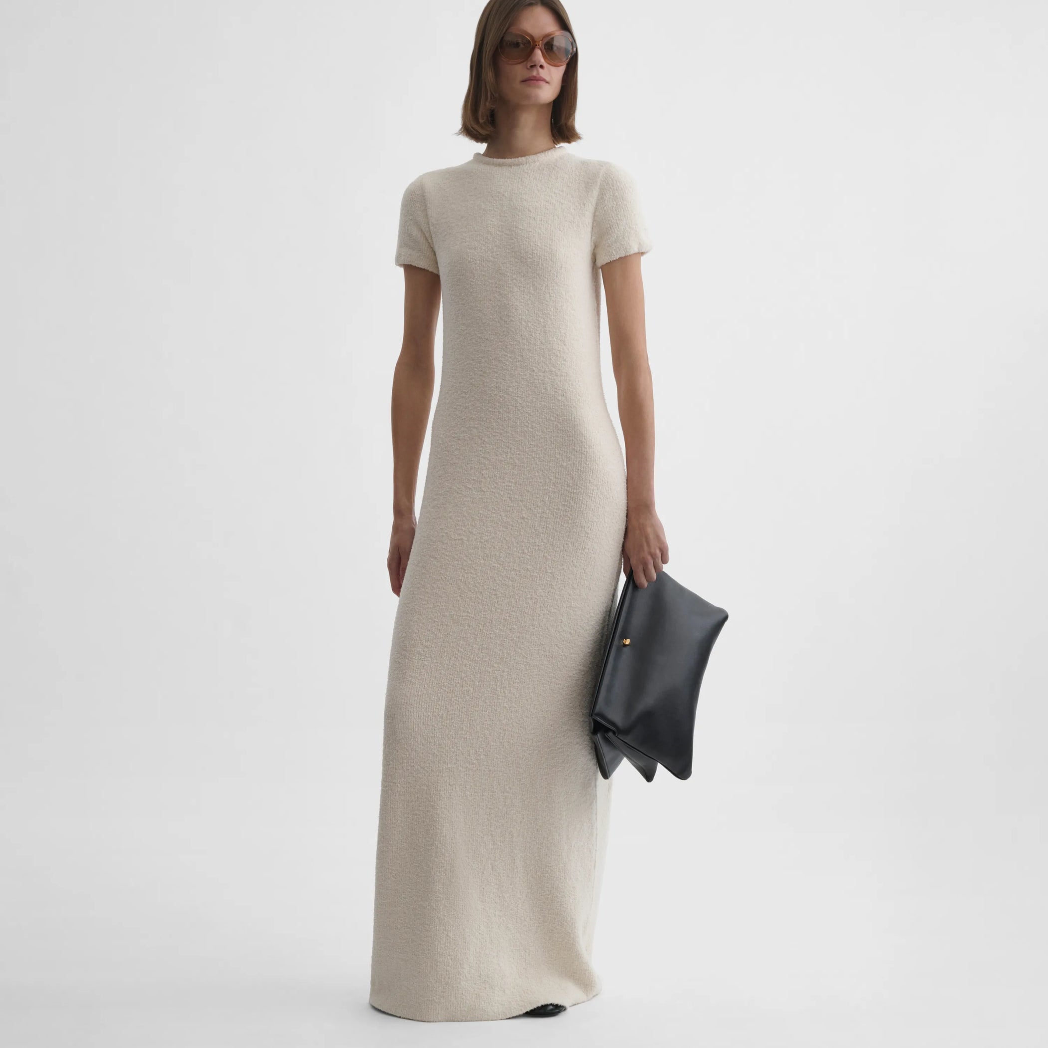 Front view of toweling t-shirt dress in cream cotton sponge