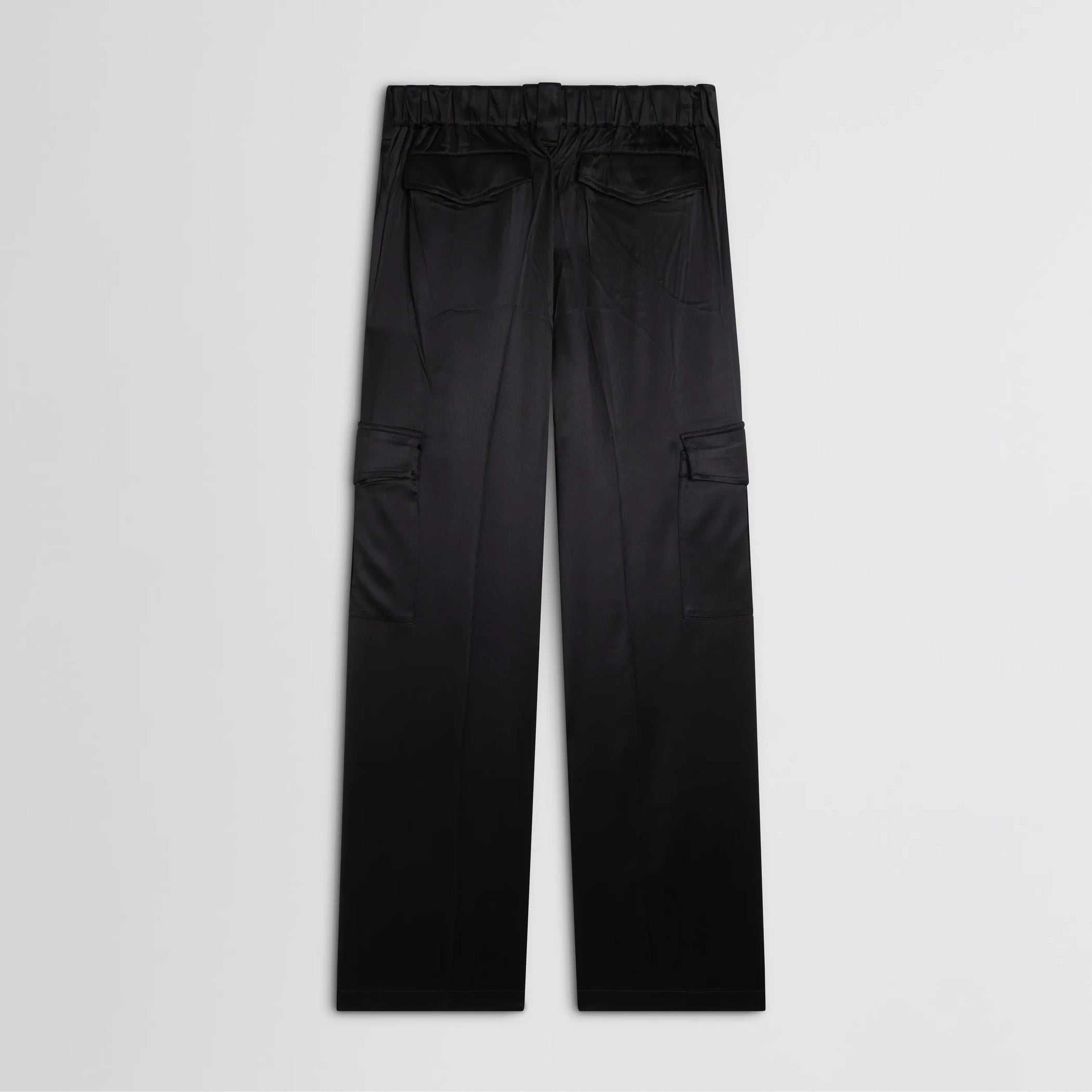 Flat back view of liquid cargo trousers in black silk
