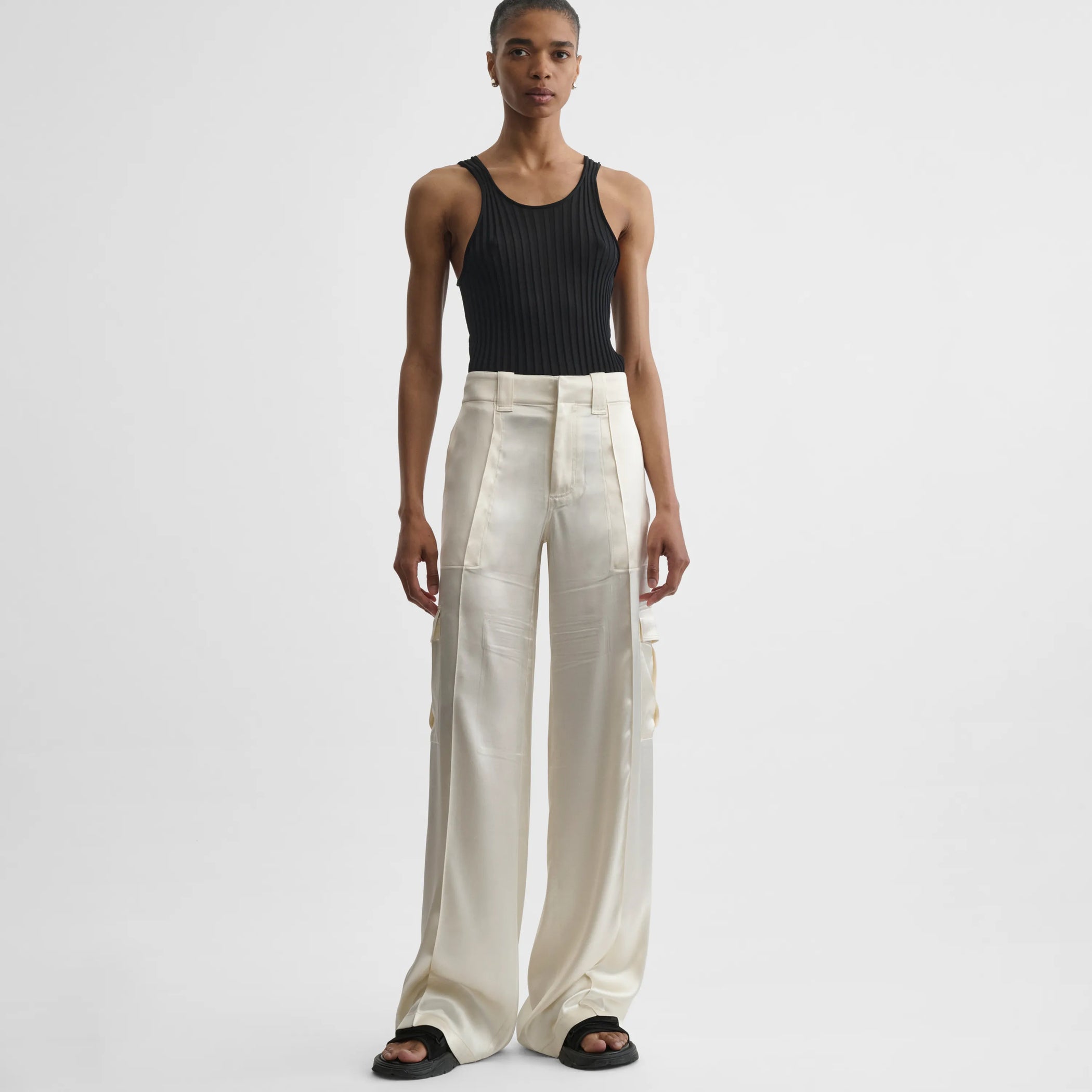 Front view of liquid cargo trousers in cream silk