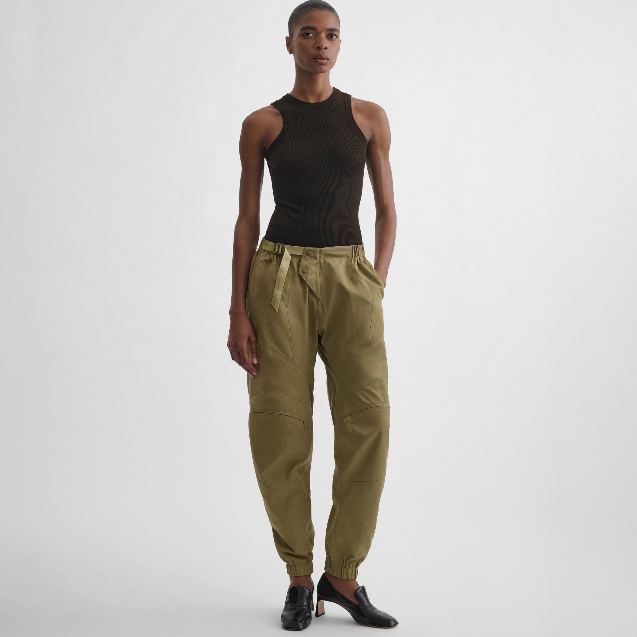Front view of the model wearing the BMX trousers in sage