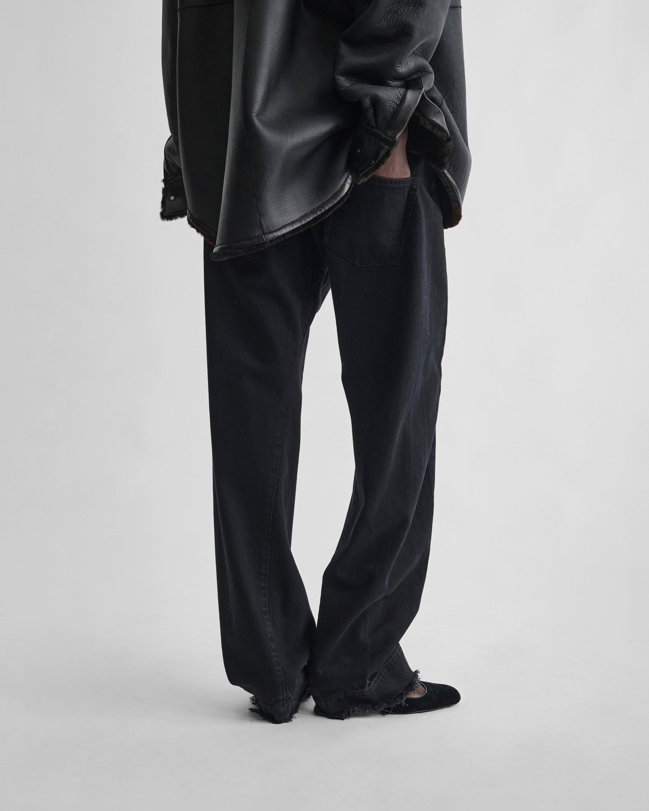 Back view of ARCH JEANS in black cotton